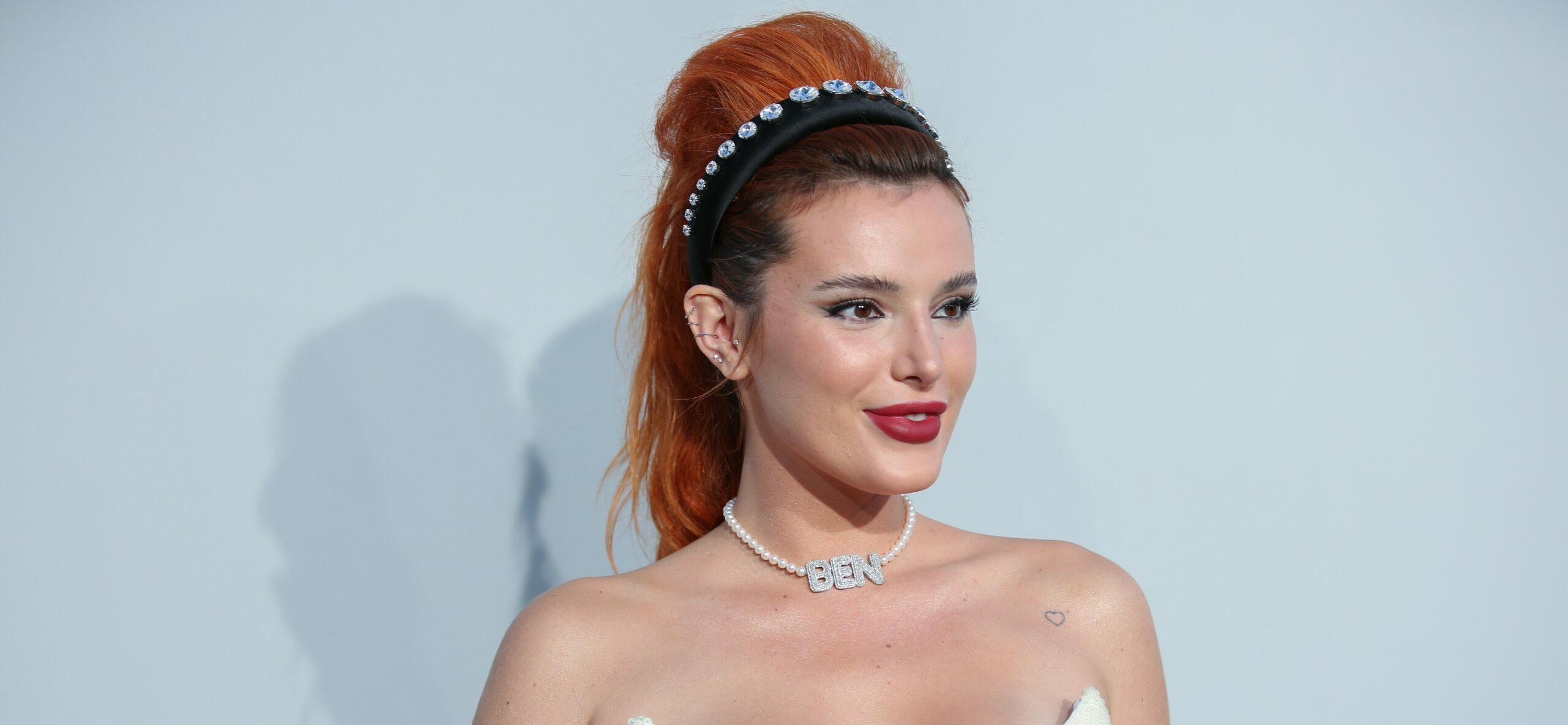 Bella Thorne flashes her assets with raunchy fishnet bra