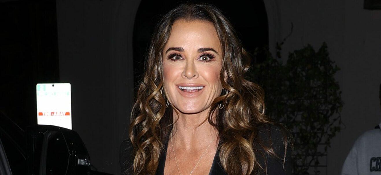 Kyle Richards shows off ripped muscles in black bikini
