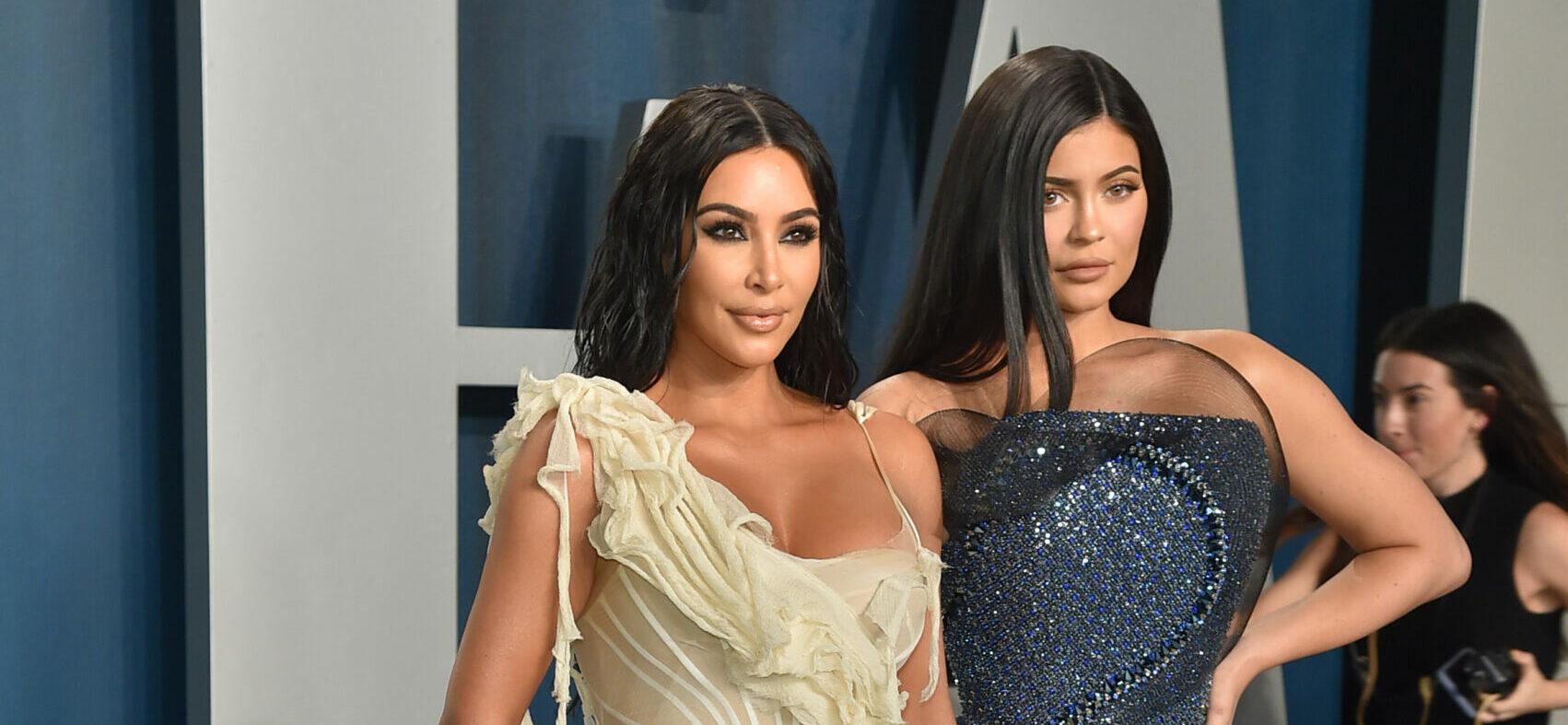 Kylie Jenner models a SKIMS top for sister Kim Kardashian with