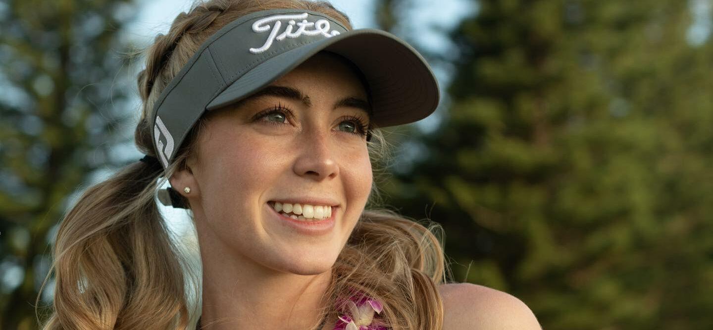 Grace Charis golfs in her busty crop top in Hawaii