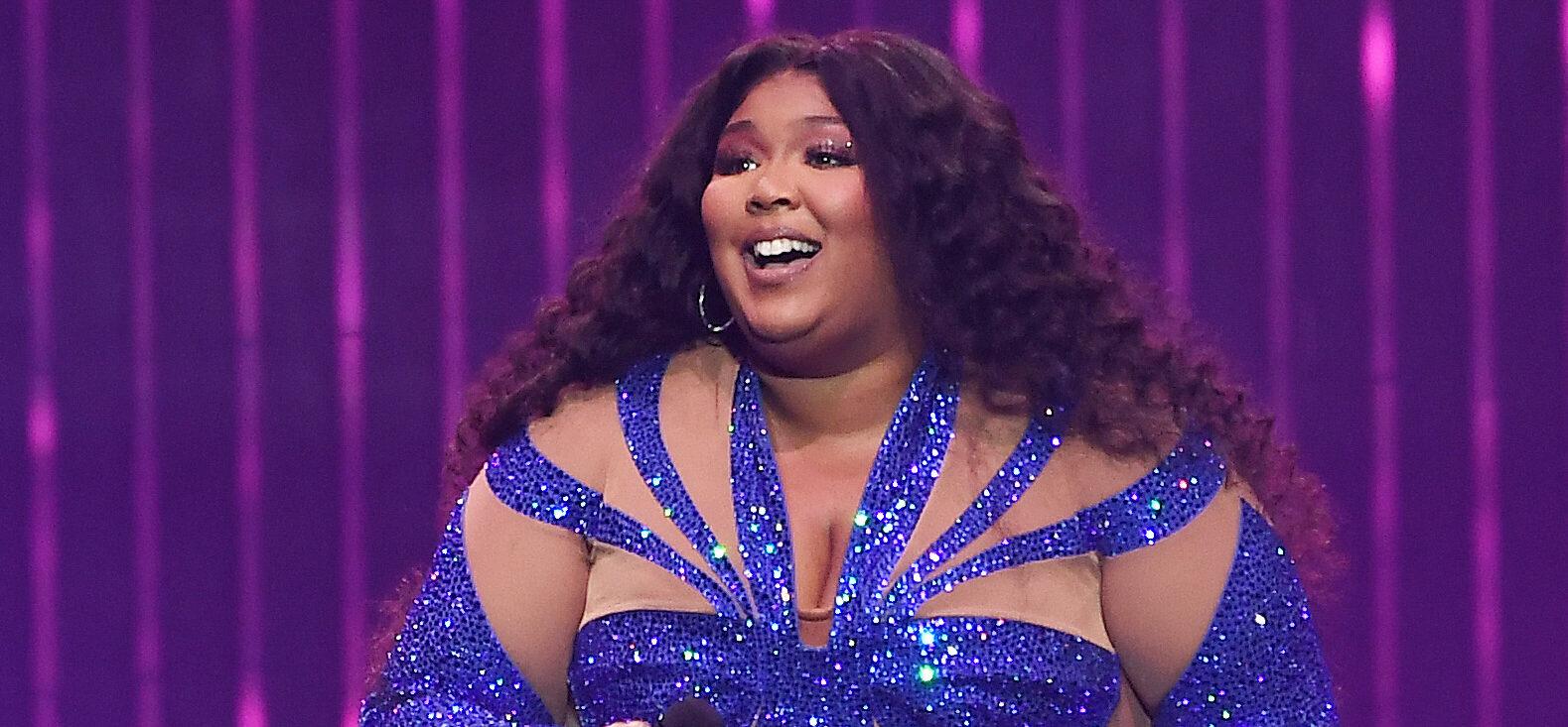 Lizzo Hailed As CHAMPION For Thumbing Nose At Drag Queen Ban