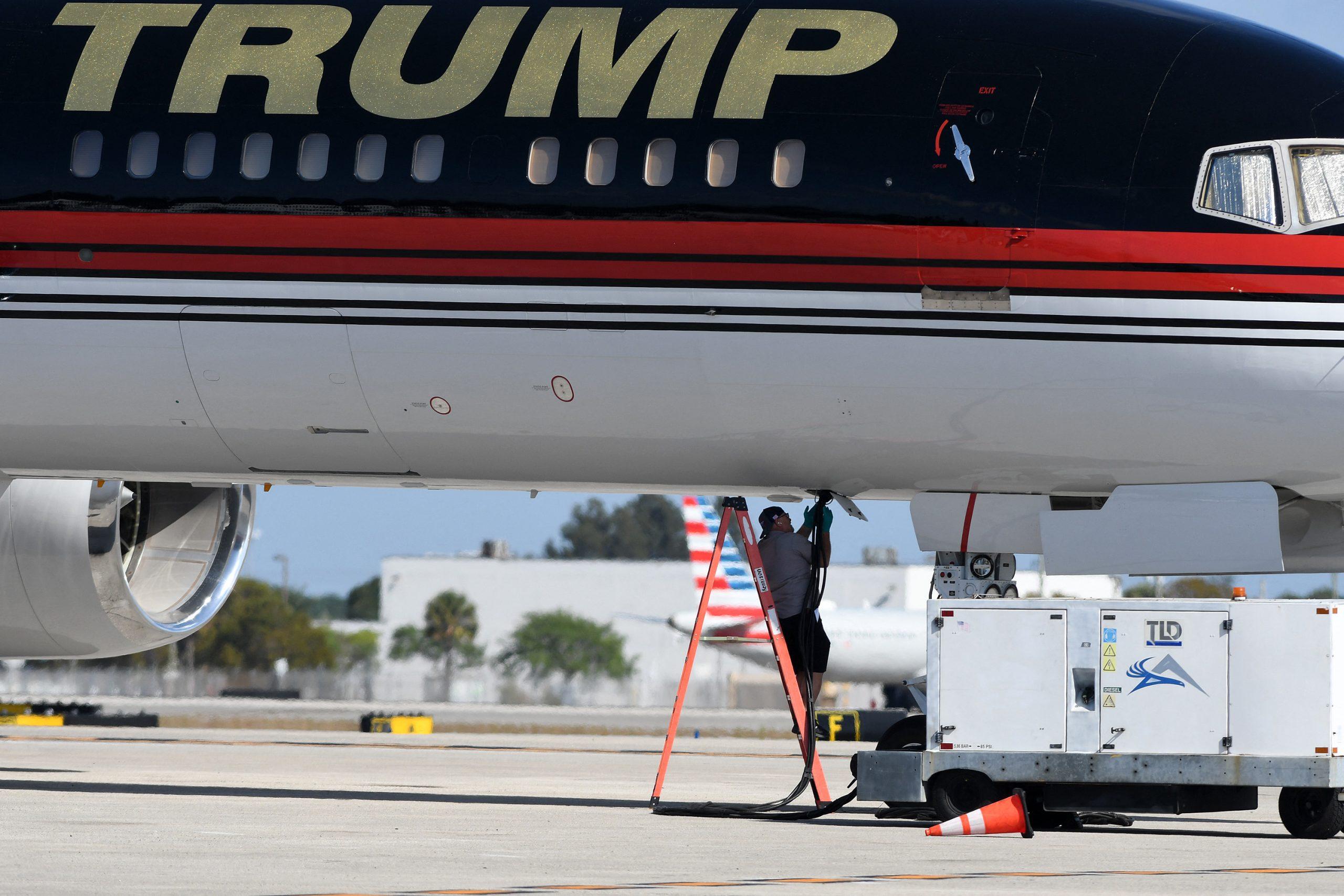 Donald Trump apos s jet is being prepared for departure from Palm Beach International