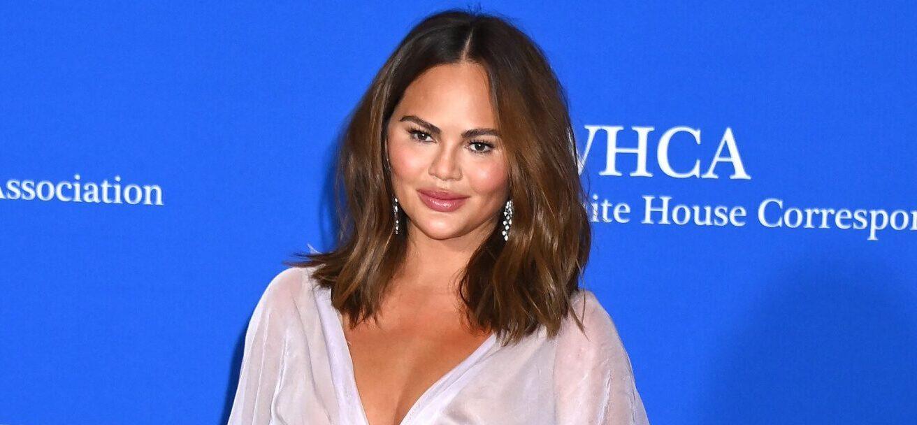 Chrissy Teigen Claps Back At George Santos’ Criticism Of Her Look At WHCD23