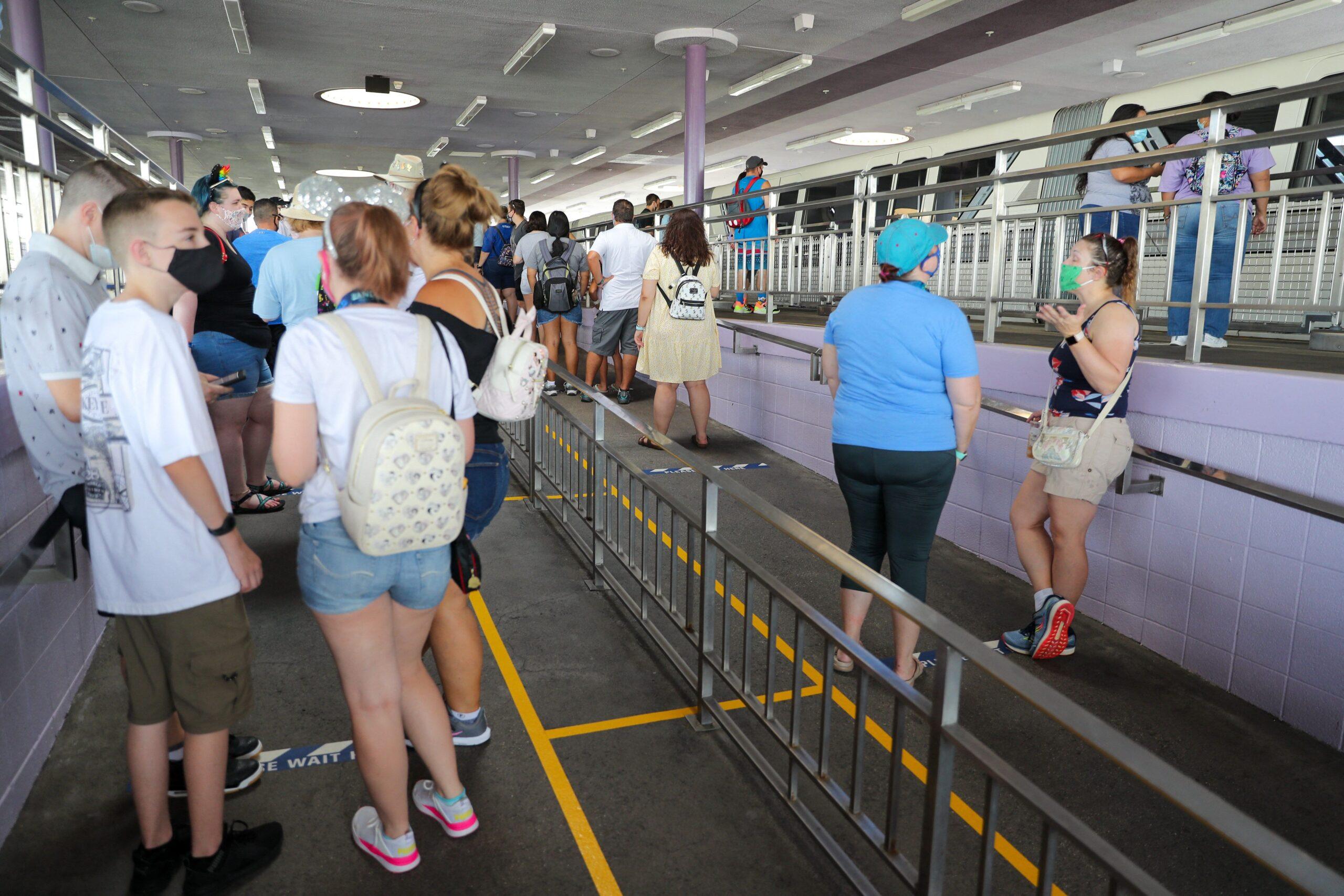 Guests waiting for monorail at Disney World