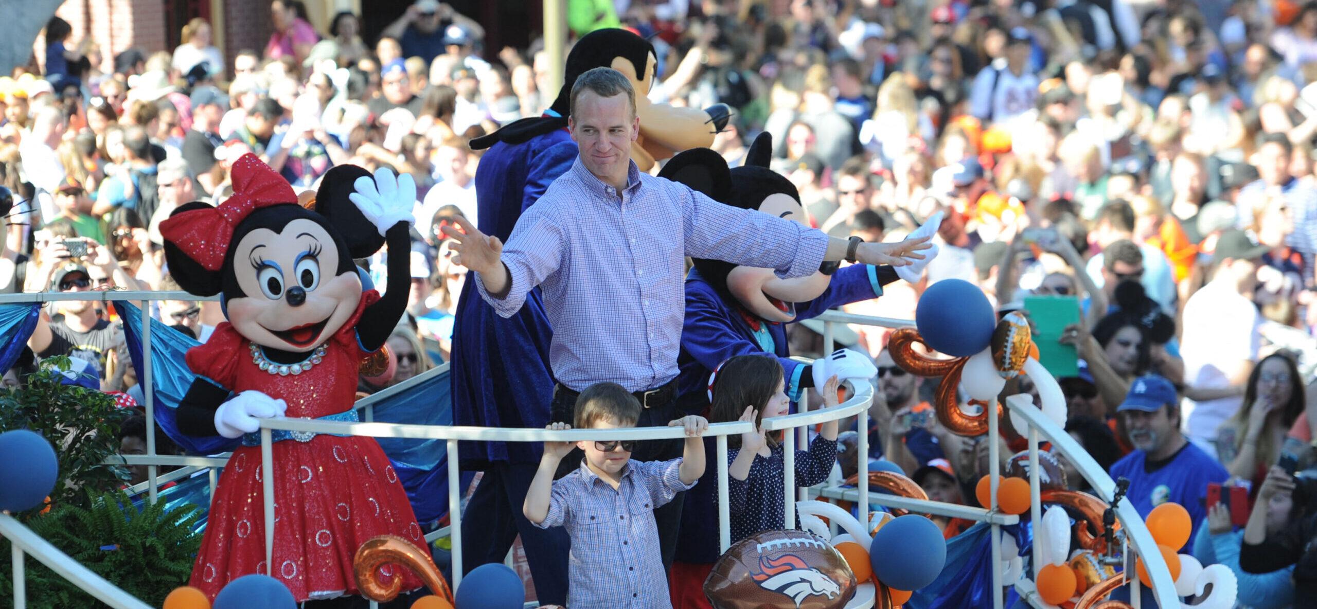 Peyton Manning And Phil Simms Spotted Filming At Magic Kingdom