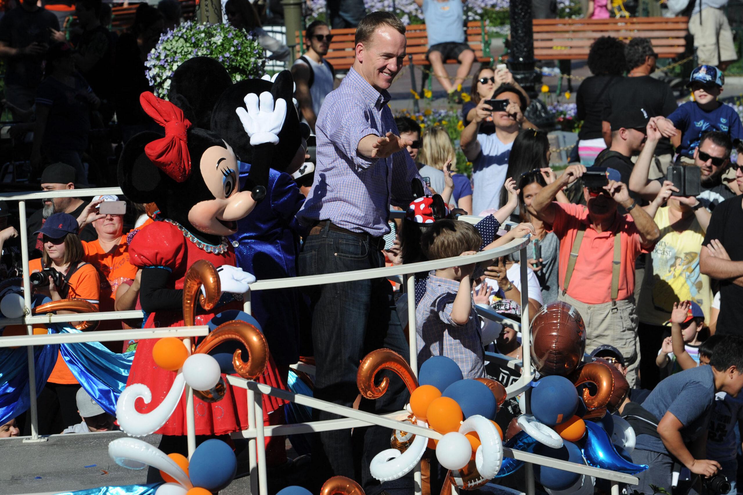 Peyton Manning And Phil Simms Spotted Filming At Magic Kingdom