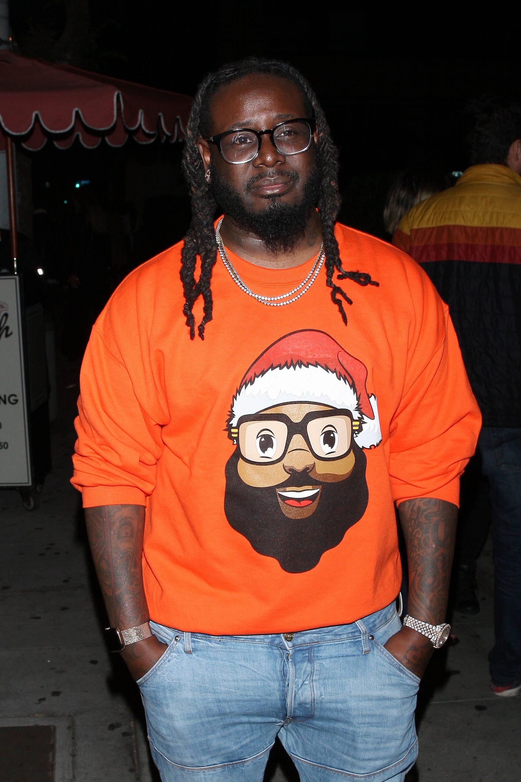 Rapper T-Pain is seen leaving the Delilah restaurant