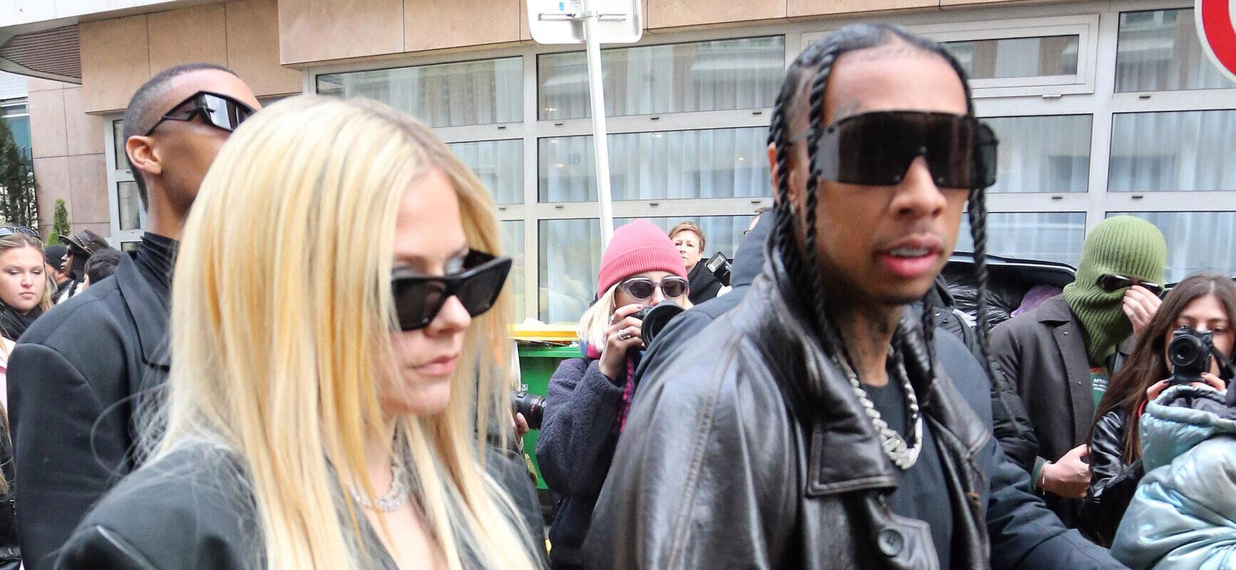 Singer Avril Lavigne and Tyga attend Y/Project runway in Paris