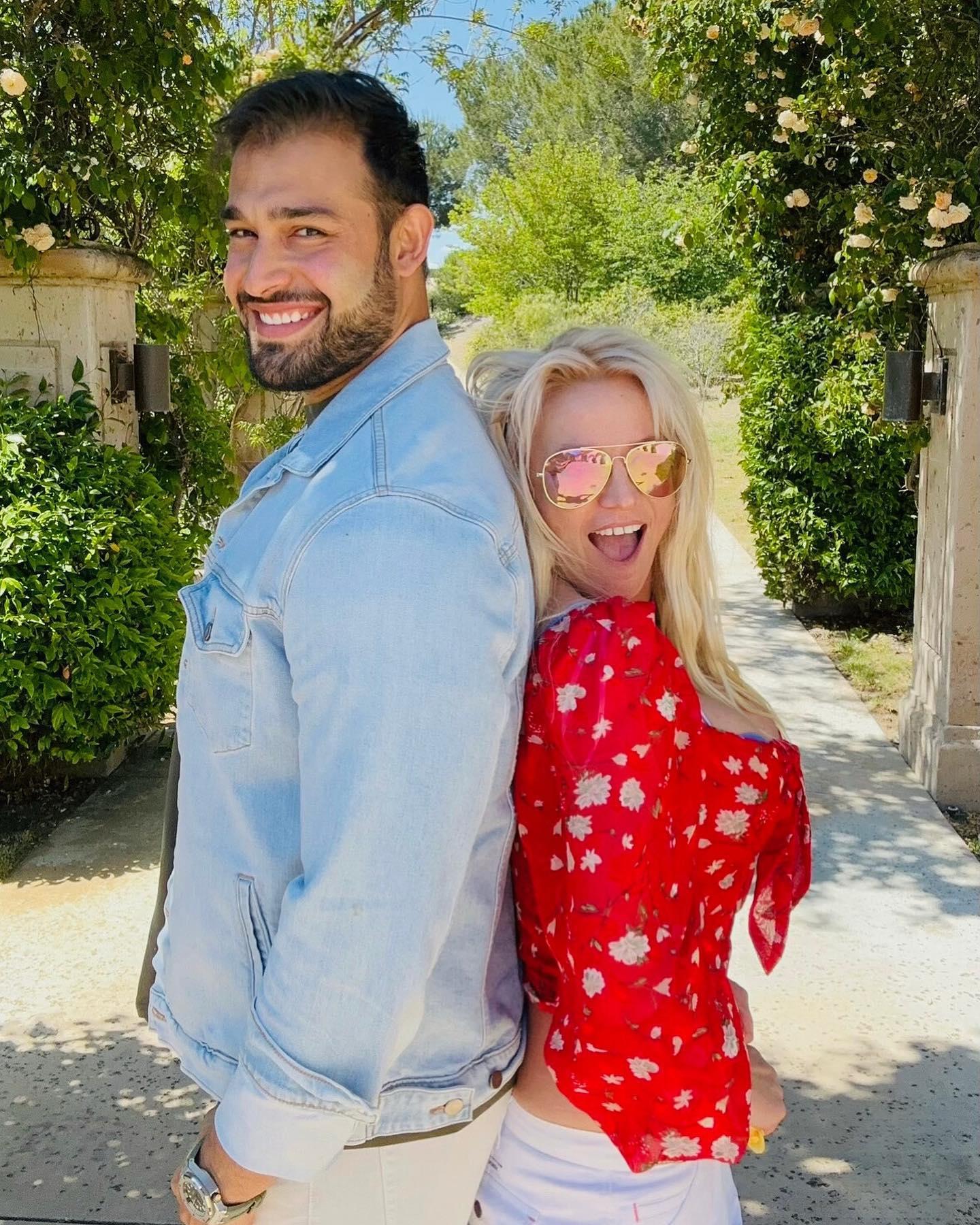 Britney Spears poses alongside Sam Asghari