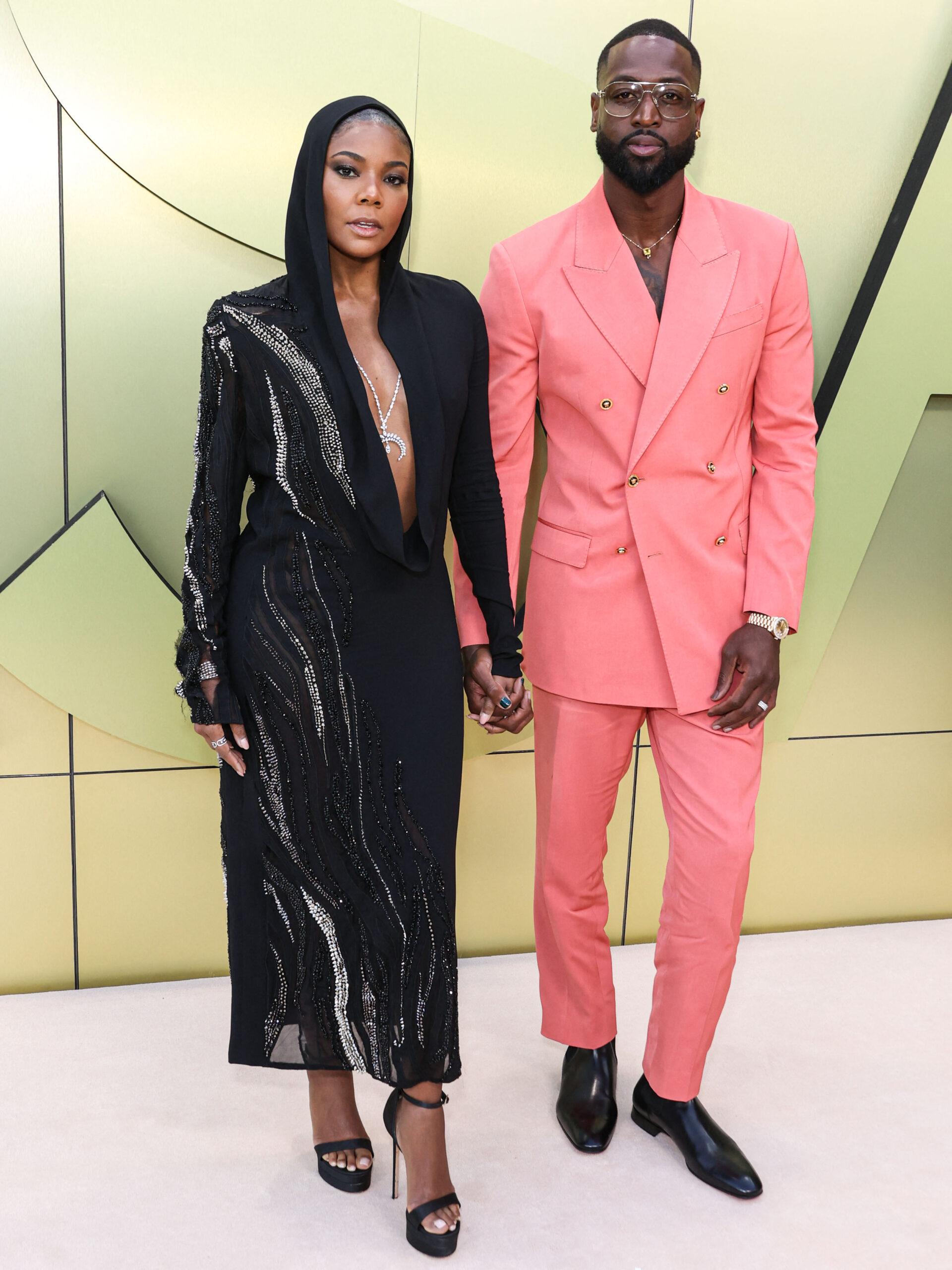 Gabrielle Union and husband Dwyane Wade arrive at the Versace Fall/Winter 2023 Fashion Show