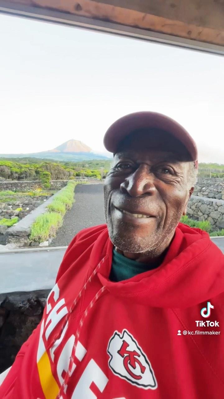 John Amos in a red jersey