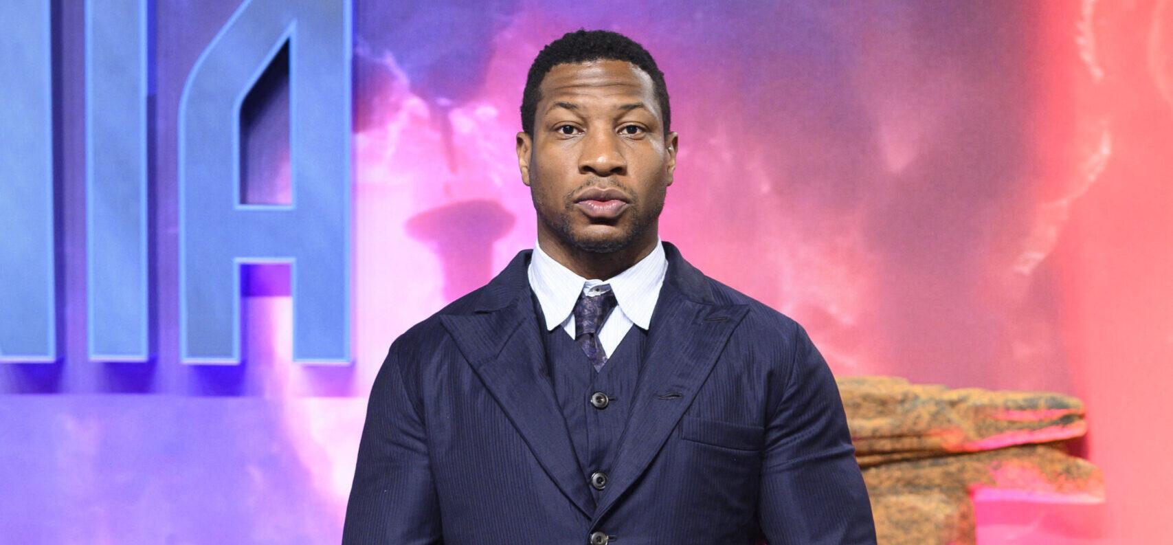 Jonathan Majors Holds Bible, Girlfriend’s Hand As He Arrives For Alleged Abuse Trial