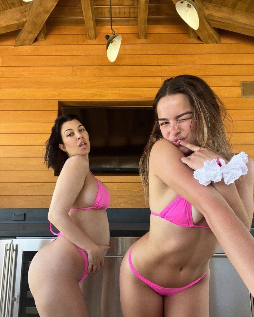 Kourtney Kardashian and Addison Rae twin in Barbiecore bikinis