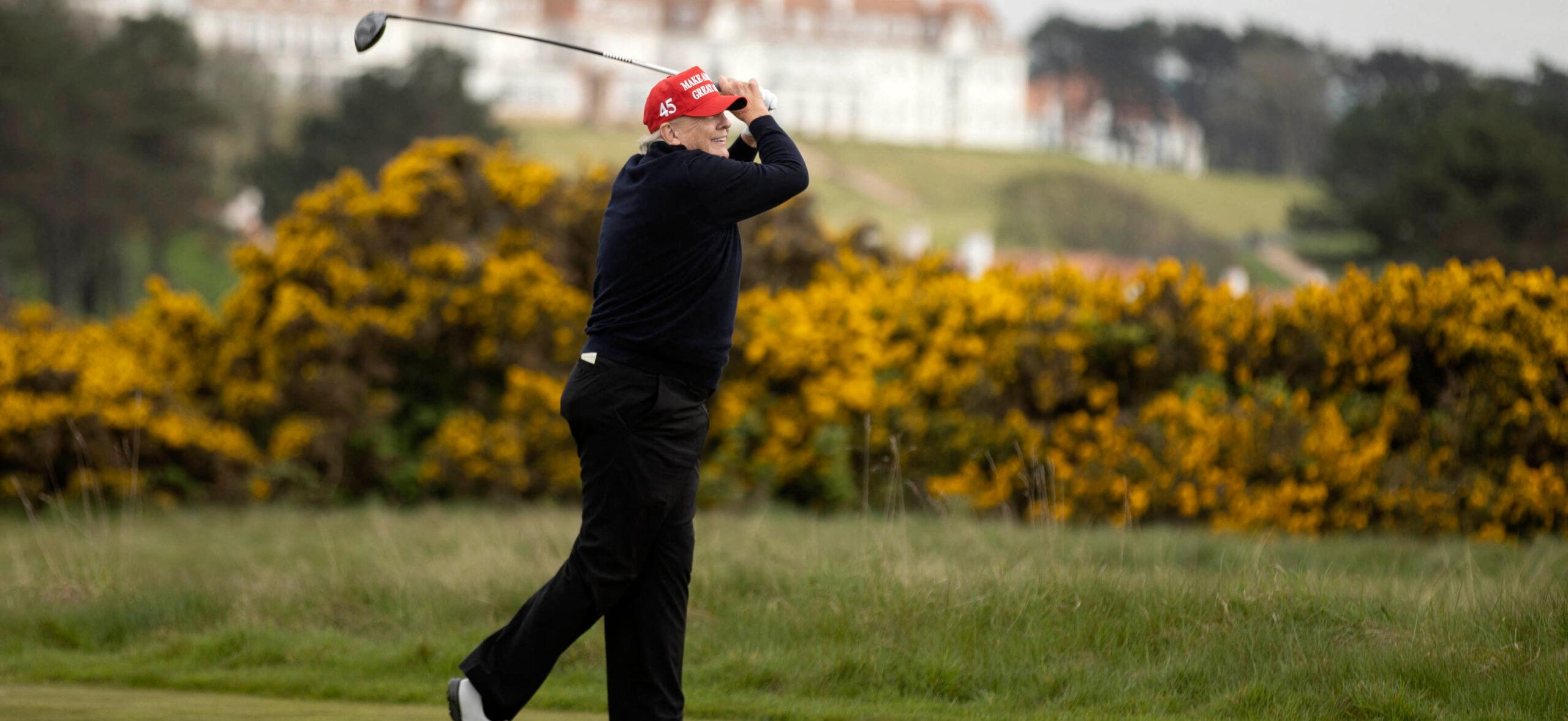 Donald Trump playing golf at his Trump Turnberry resort in South Ayrshire
