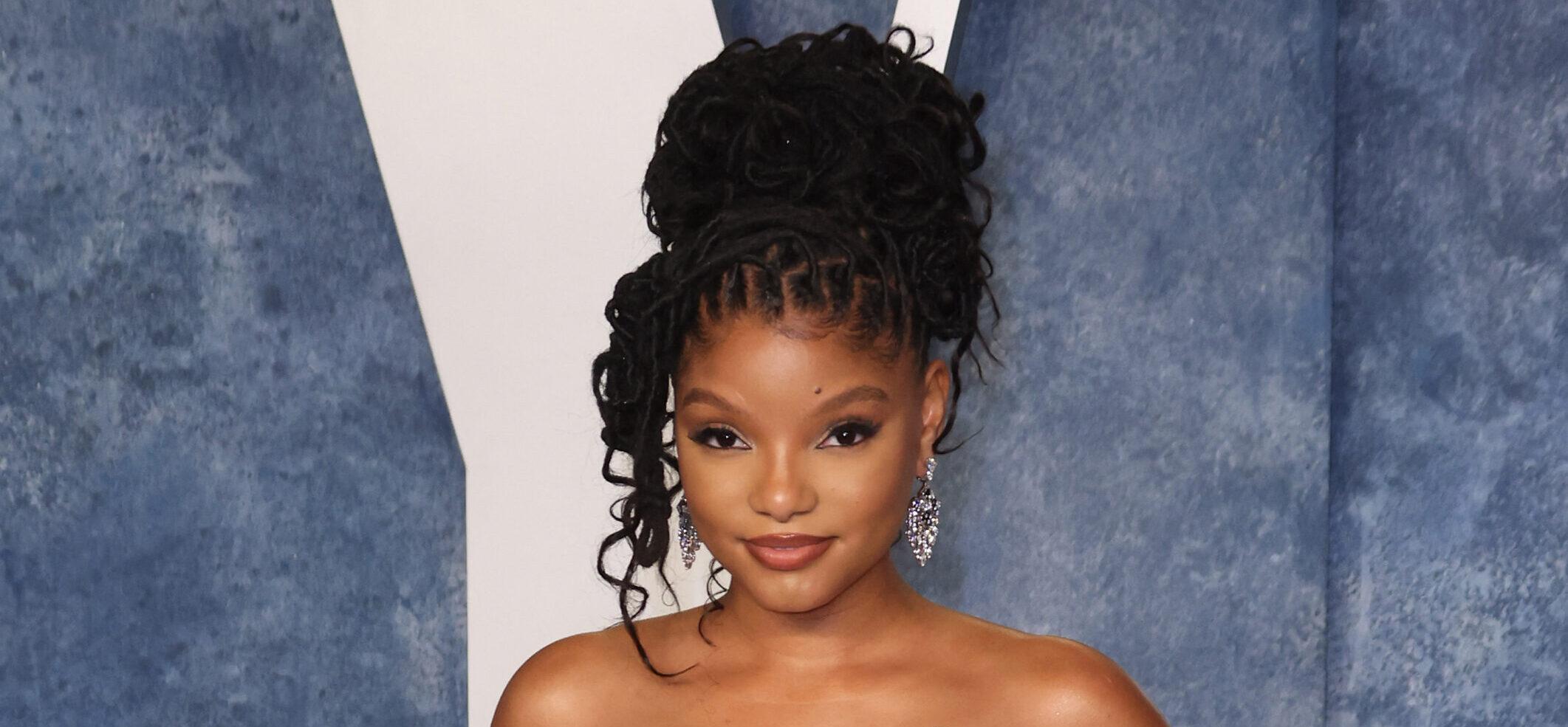 Halle Bailey Stuns In Pink Water Suit: ‘Water Girl Forever’