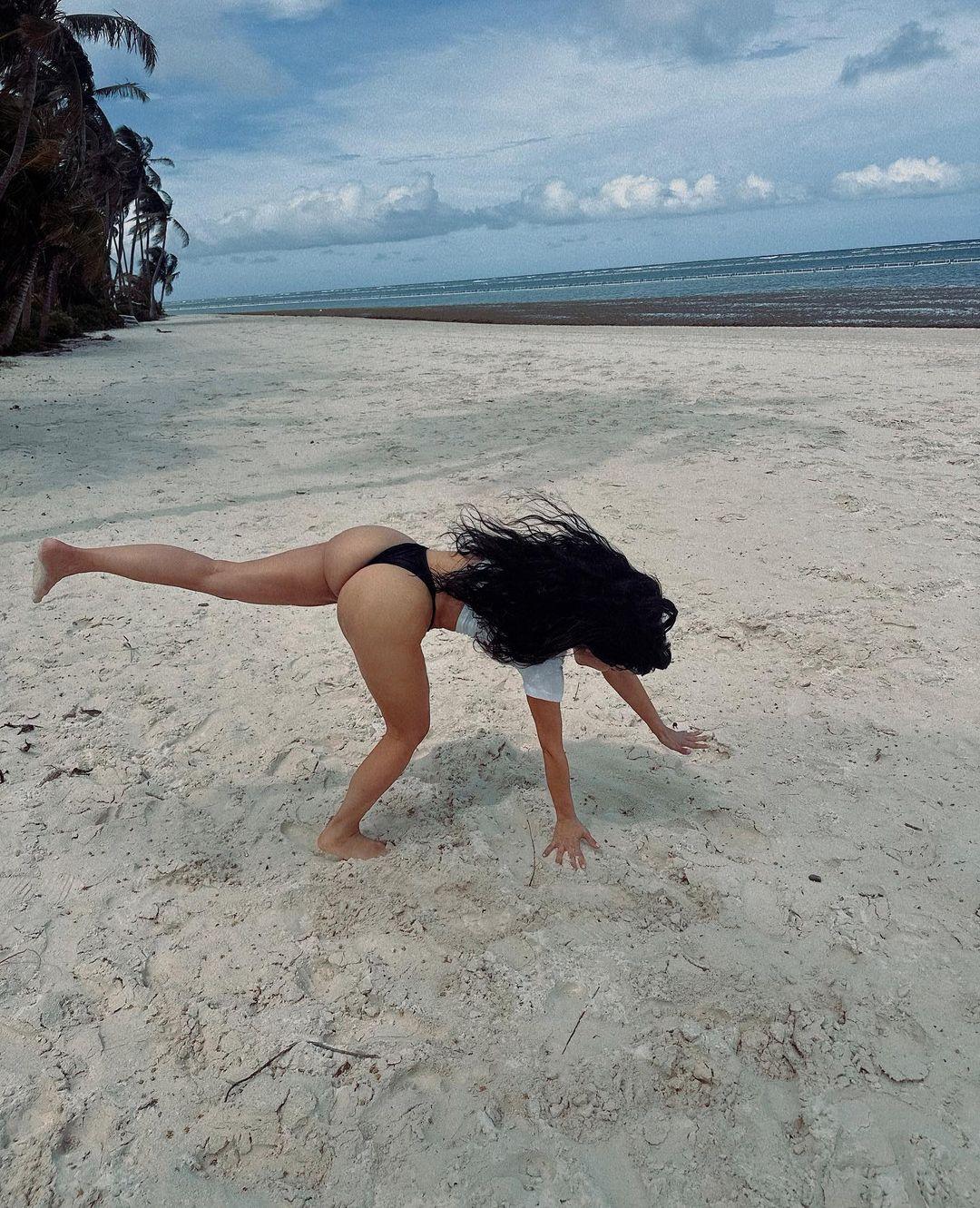 Billionaire Kim Kardashian Does A Cartwheel In A Thong On The Beach 