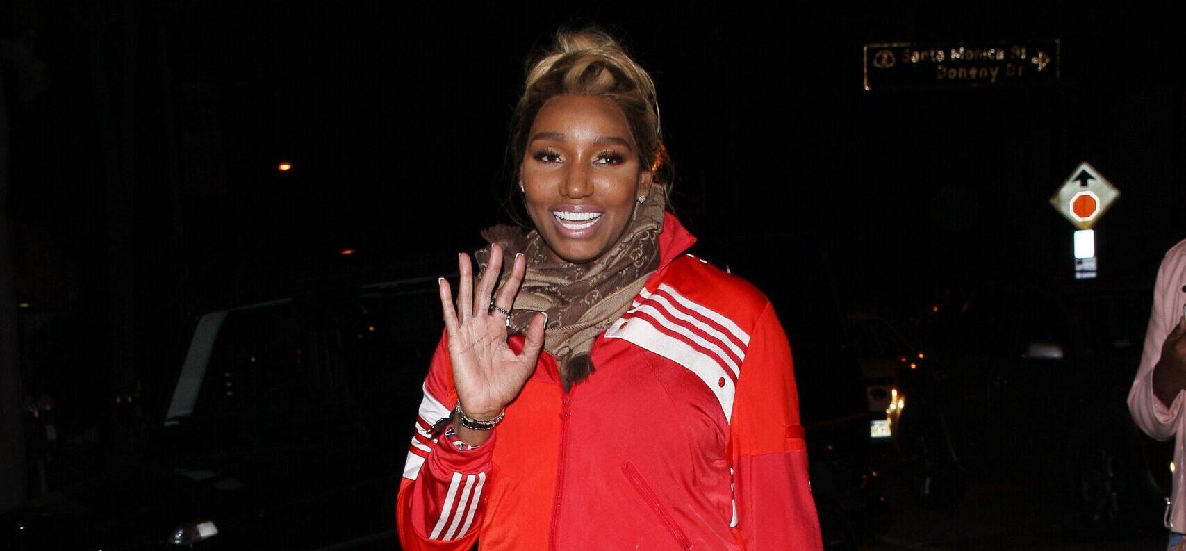 NeNe Leakes sports a red Adidas tracksuit as she dines at LA hot spot Craig apos s