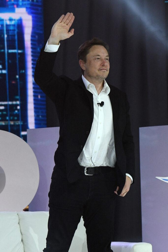 Elon Musk joins a panel discussion during a POSSIBLE marketing conference and sends the crowd wild as he plays with his adorable son onstage at the Fontainebleau Hotel in Miami