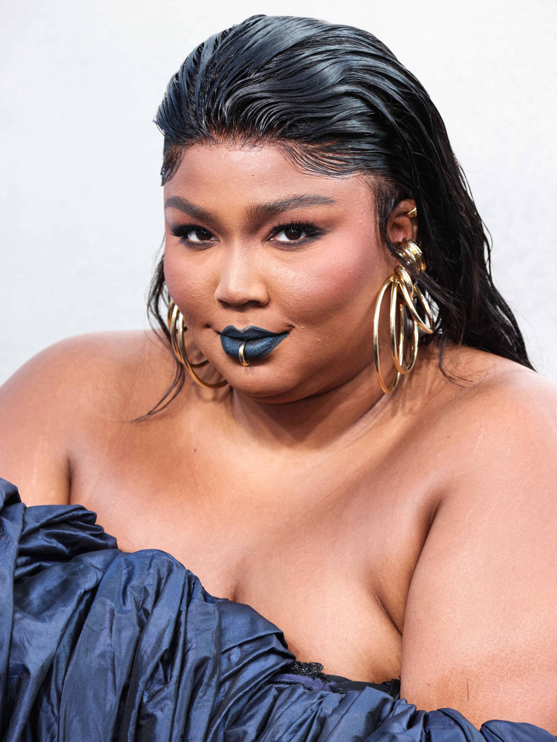 Lizzo wearing a Jean Paul Gaultier Couture dress arrives at the 2022 MTV Video Music Awards