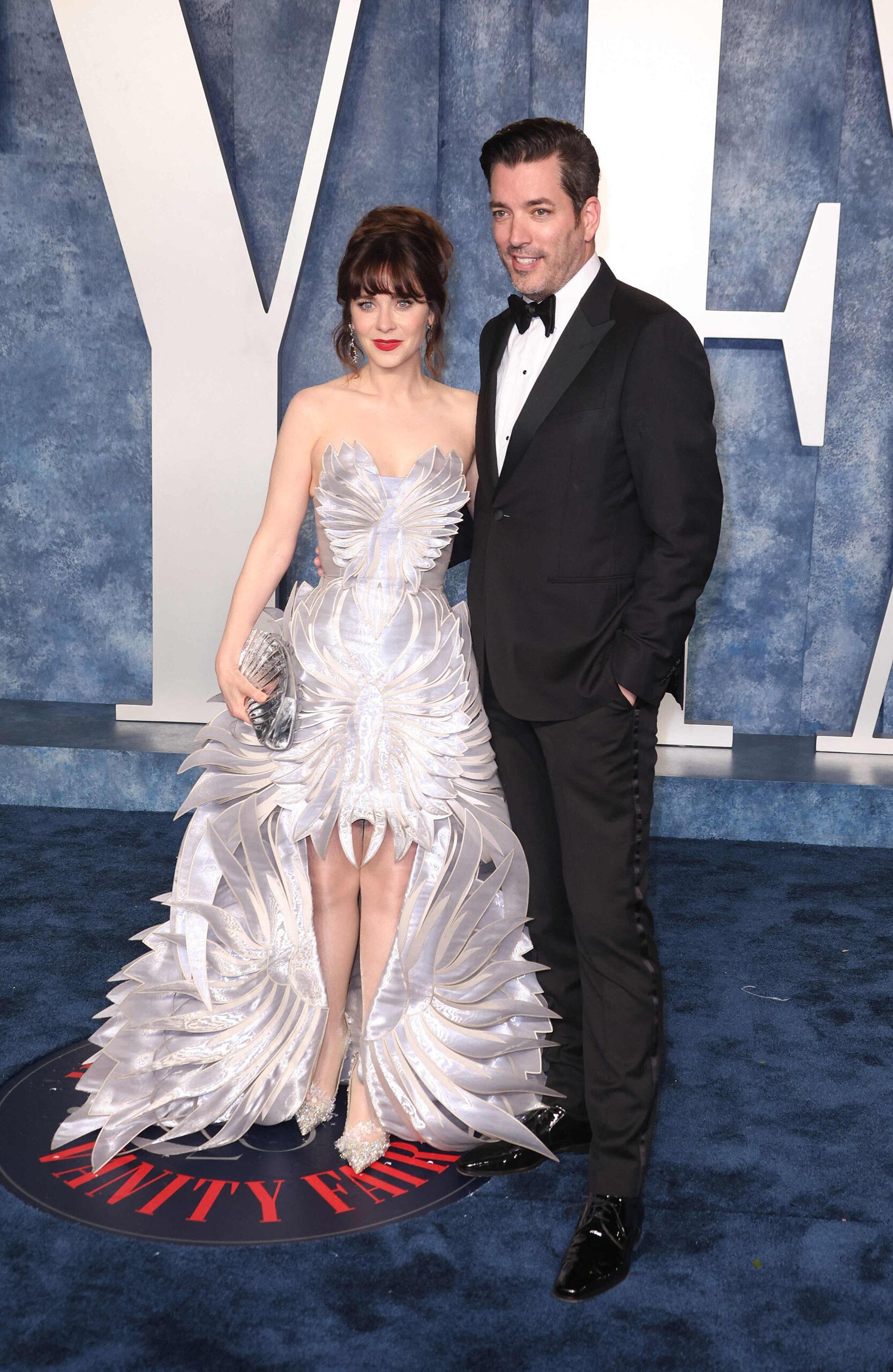 Zooey Deschanel and Jonathan Scott at the 2023 Vanity Fair Oscar Party - Arrivals