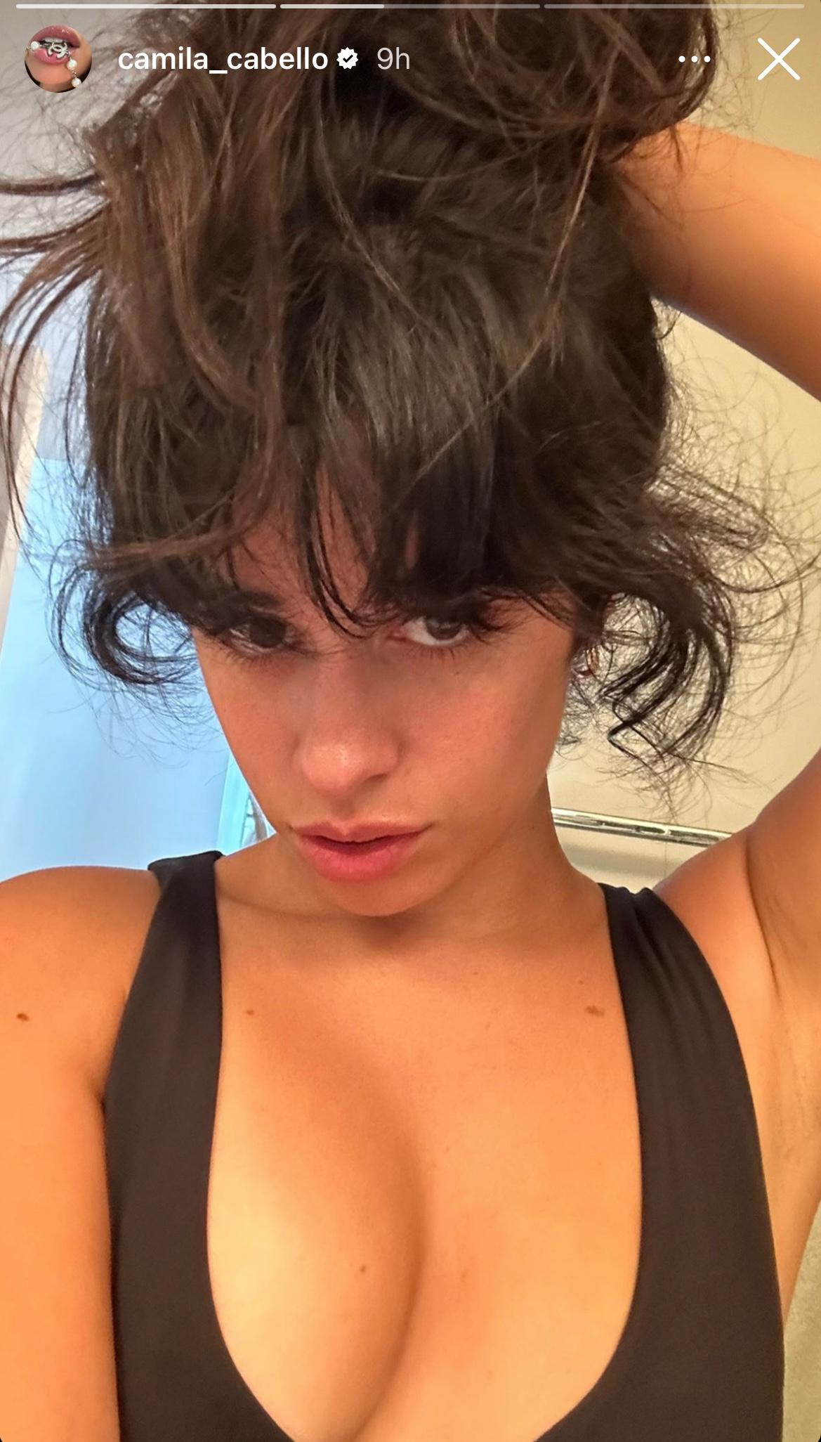 Camila Cabello shares selfie of messy hair and cleavage