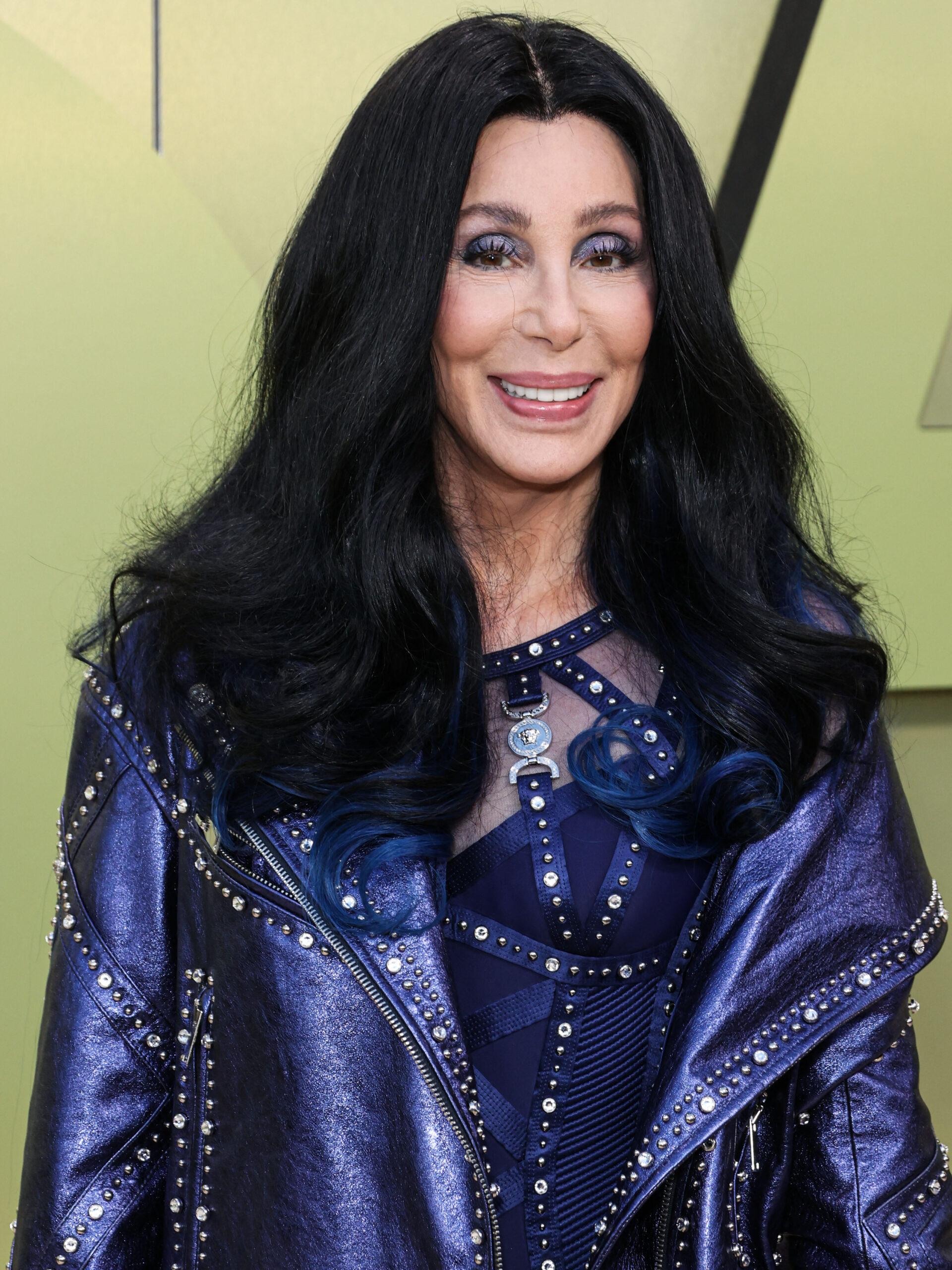Cher arrives at the Versace Fall/Winter 2023 Fashion Show