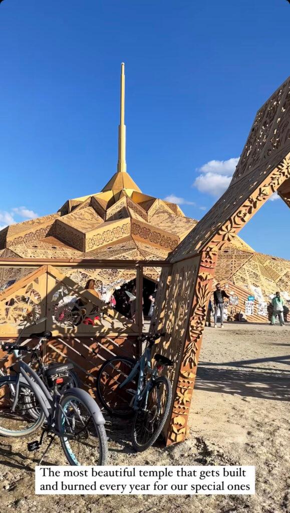 Demi Rose taking pictures at Burning Man 2023.