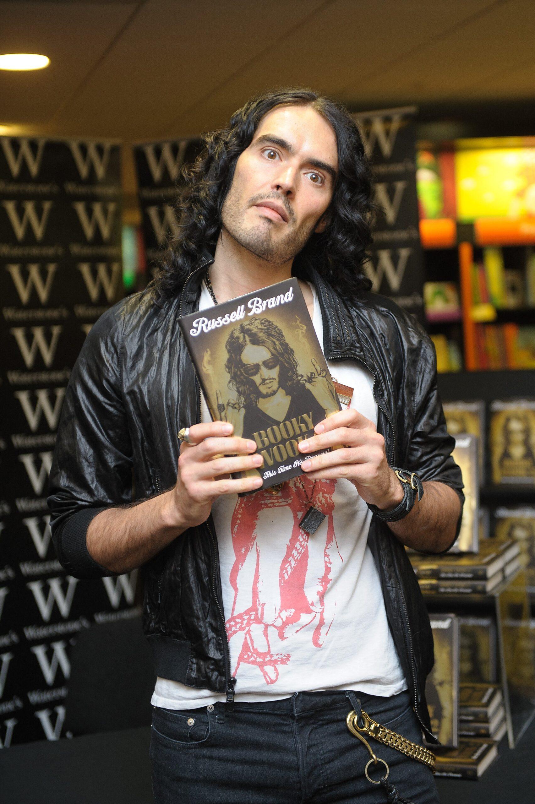 Underfire comedian Russell Brand , pictured here in 2010 in Edinburgh for a book signing for his second book "Booky Wooky 2". Allegations of rape and unwanted sexual behaviour have been levelled at Brand by the Sunday Times newspaper and Channel 4 Dispatch