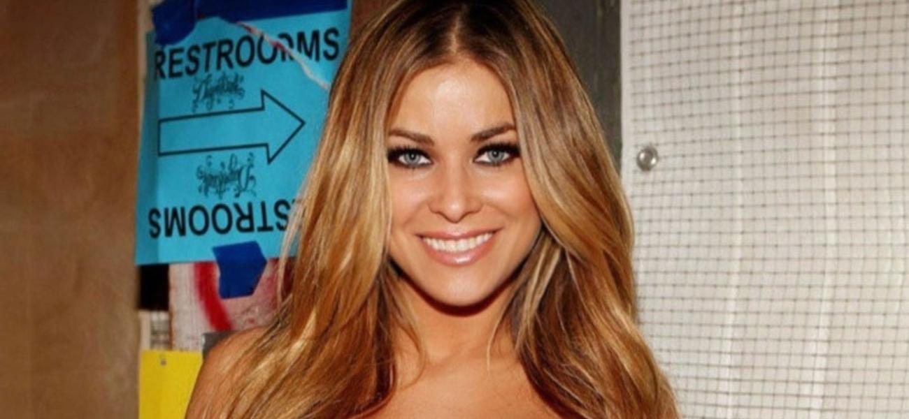 Carmen Electra looks a bit fuller around the middle in a tight