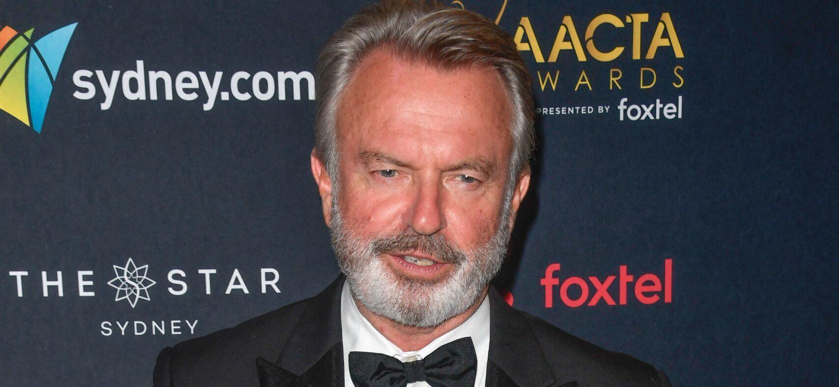 ‘Jurassic Park’ Star Sam Neill Claims He’s Not ‘Afraid’ Of Death In Sad Cancer Update