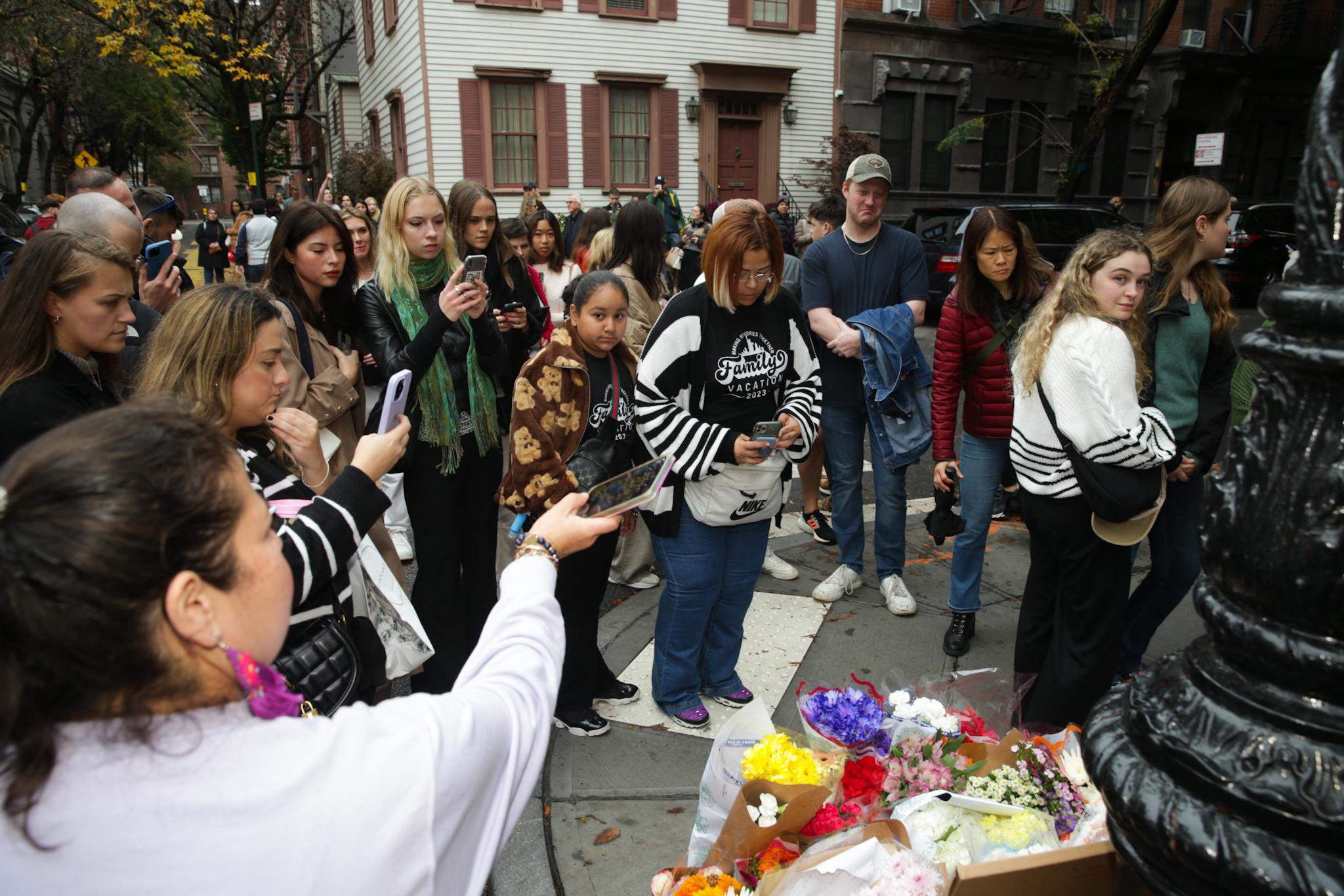 Friends' Fans Mourn Matthew Perry in New York City (Exclusive)