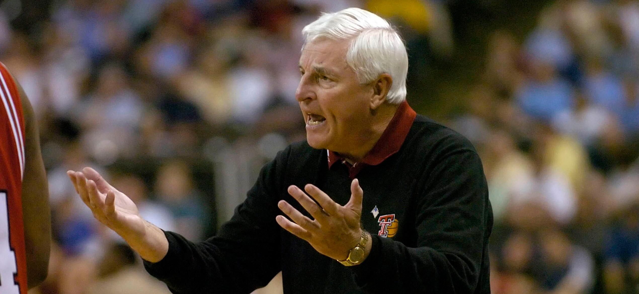 Bob Knight talks to members of his Texas Tech team during a timeout against Boston College in their NCAA East regional first round game