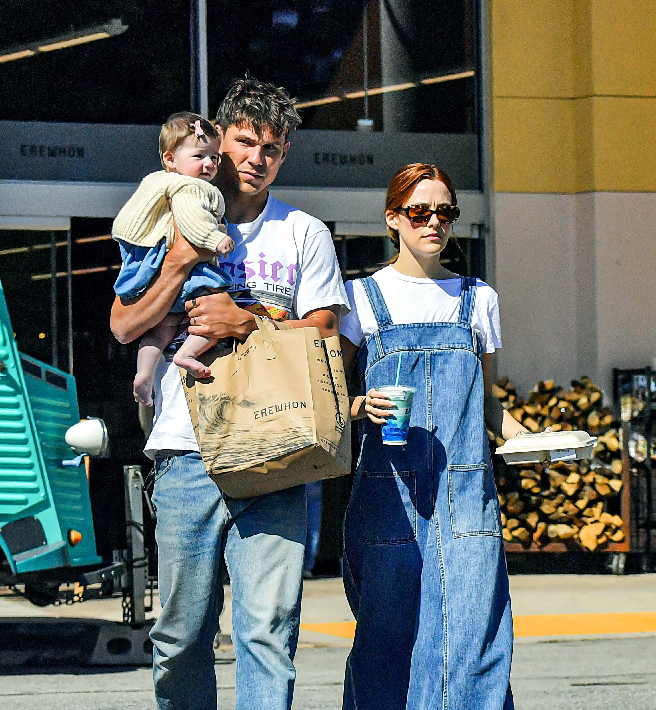 Riley Keough and her husband Ben Smith-Petersen are spotted out with their baby girl during grocery store run at Erewhon in Calabasas, CA.
