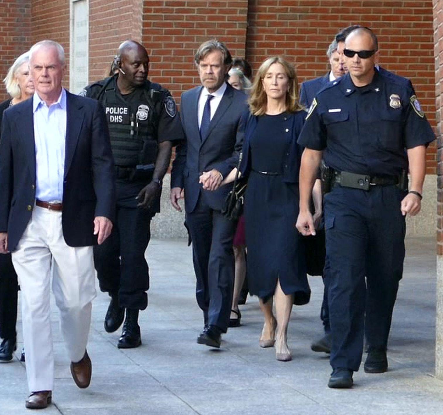 Felicity Huffman and William H. Macy leaves court