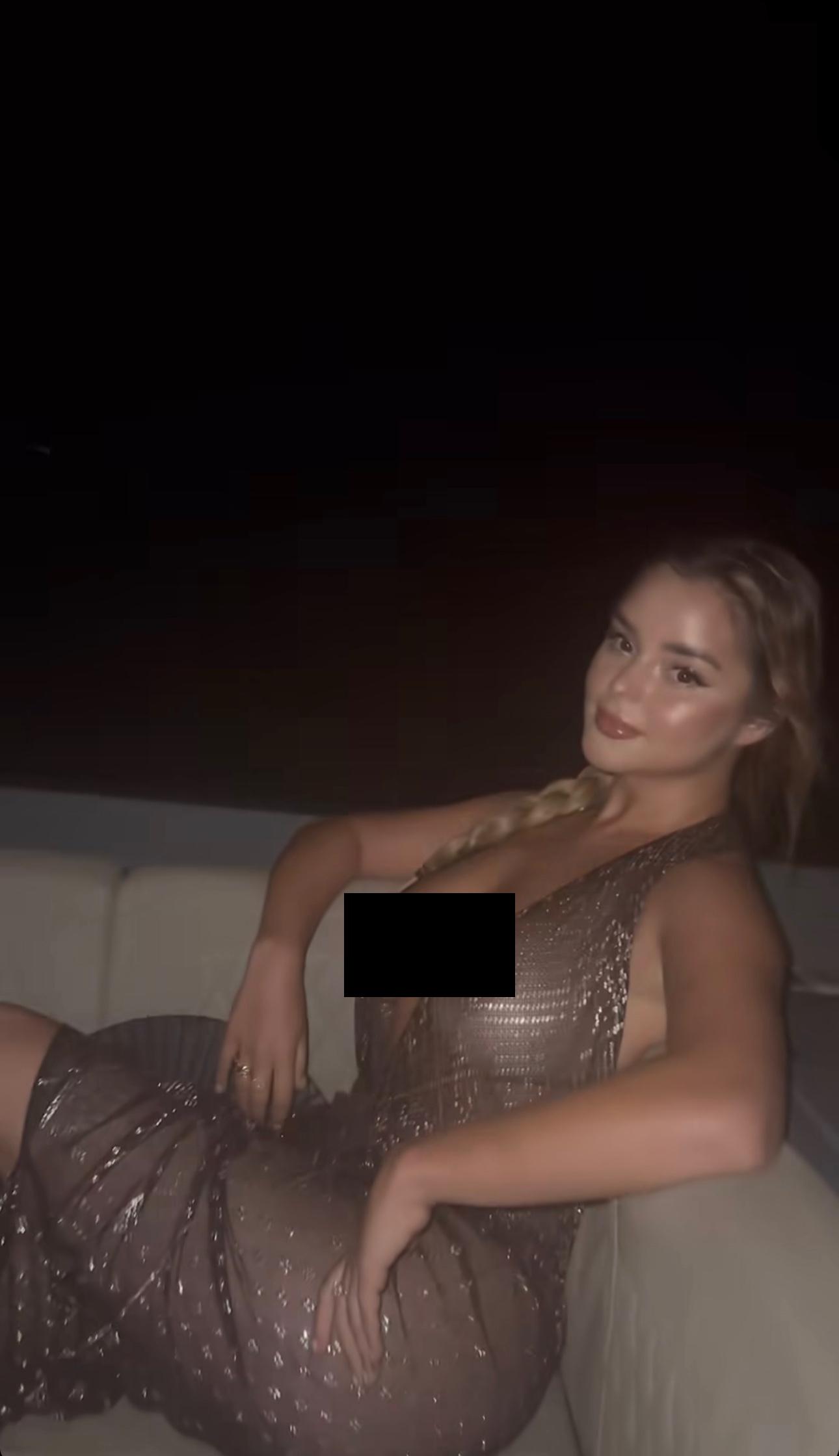 Demi Rose posing for the camera.