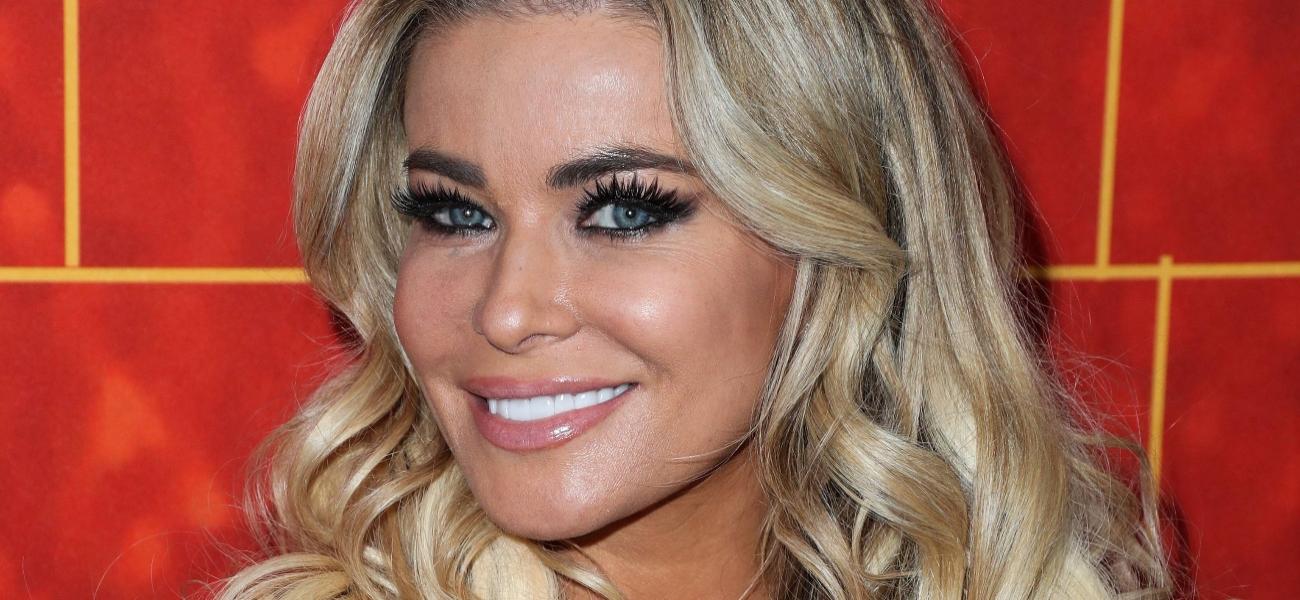 Carmen Electra In Plunging Undies Challenges Fans To A ‘Pillow Fight’