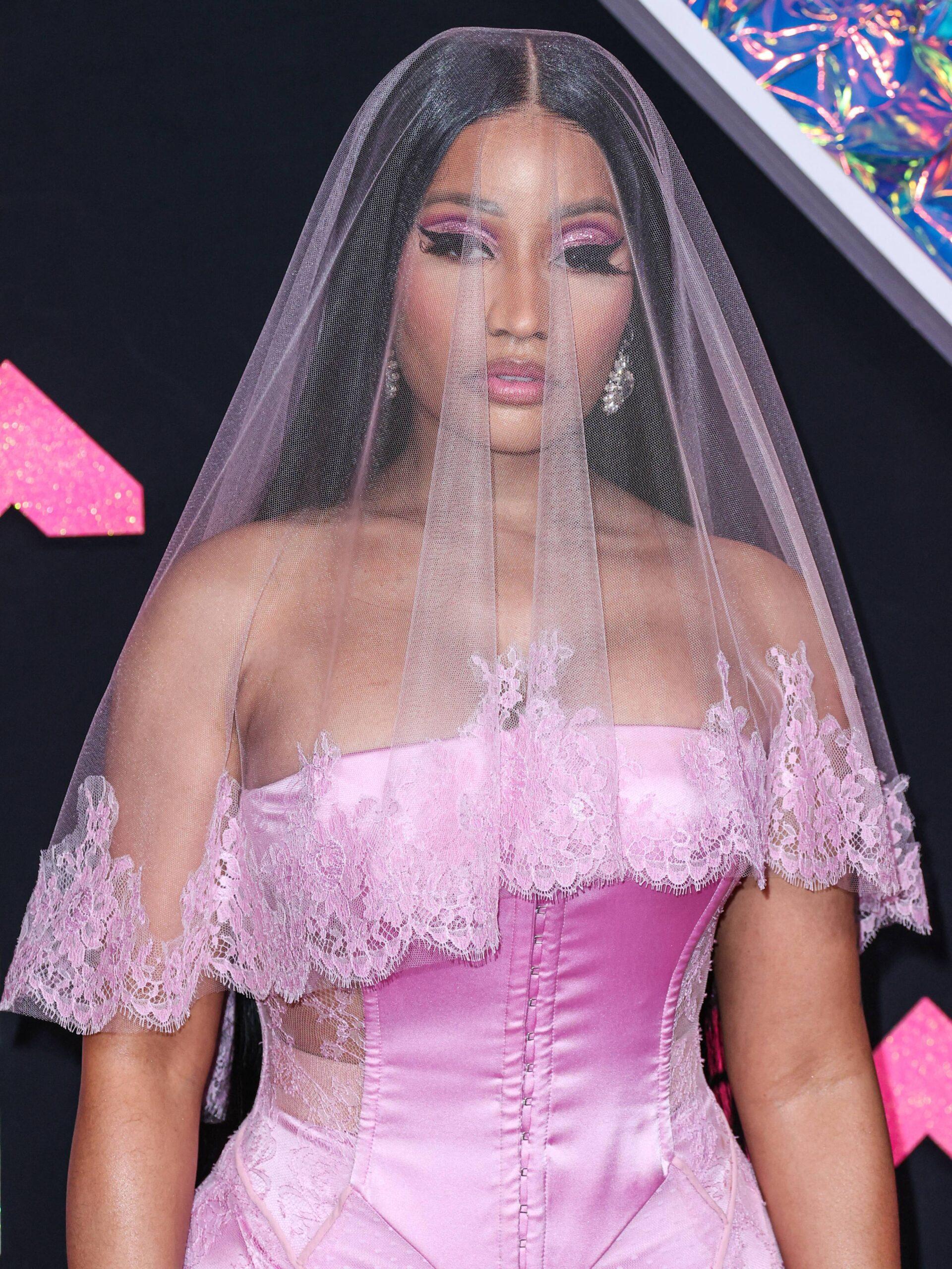 Nicki Minaj forced to get breast reduction as 'ti**ies wouldn't