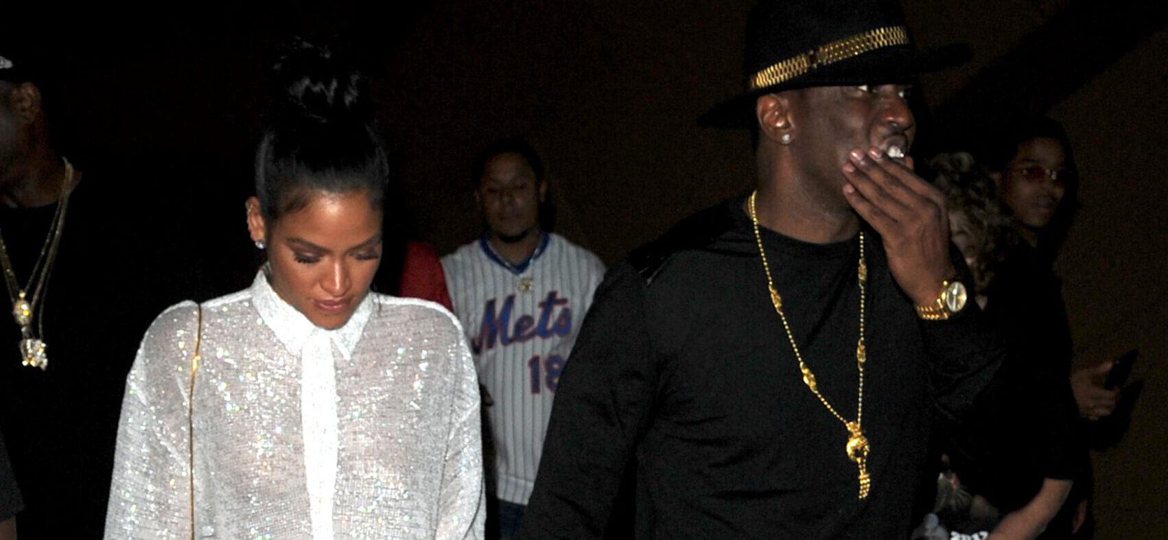 Diddy and Cassie arrive at McGregor Vs Mayweather holding a bottle of champagne