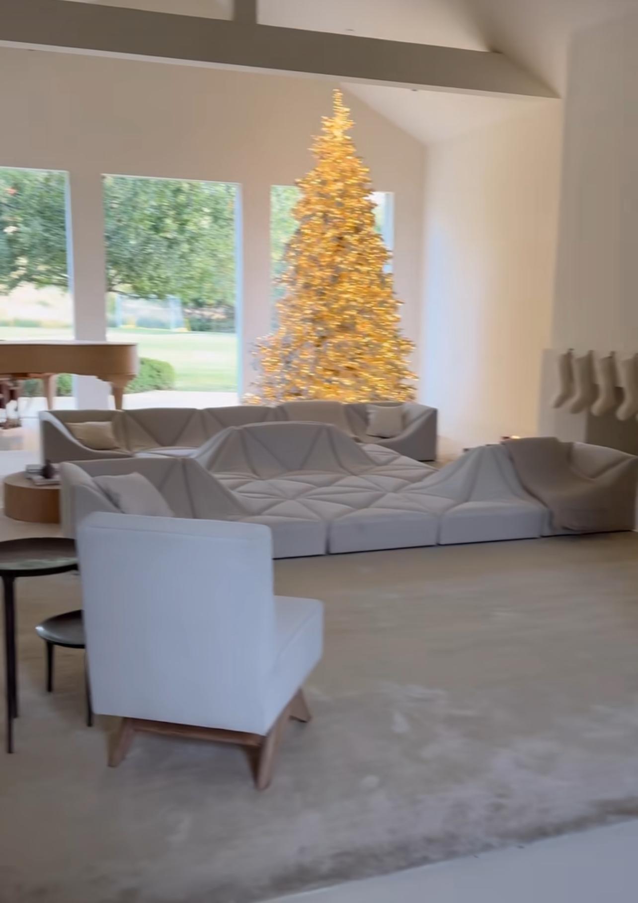 Kim Kardashian Shows Off Multiple Christmas Tree Decor & Bizzare Couch