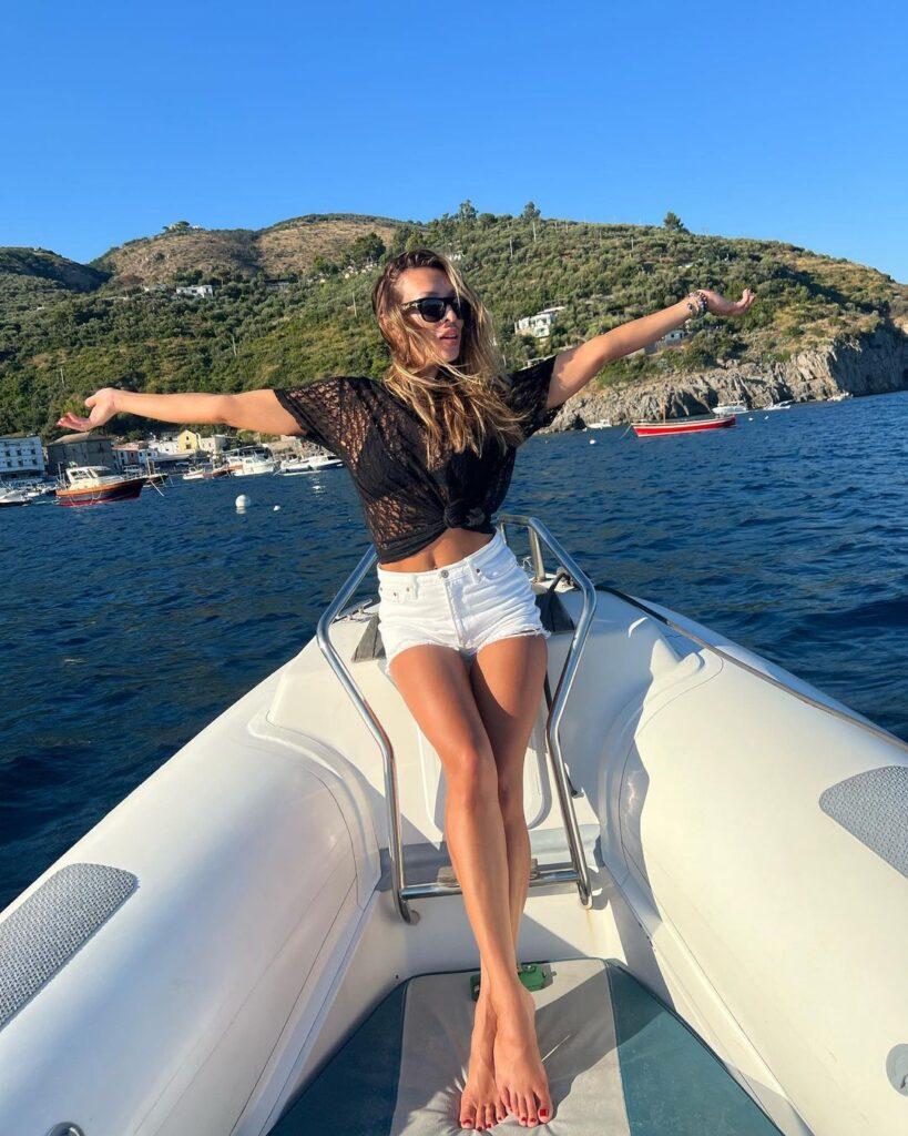 Elsina Khayrova poses on a boat.