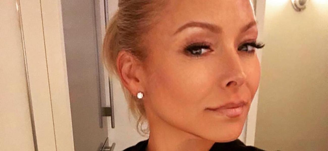 Kelly Ripa In Slit Trench Coat Proves ’52 Never Looked So Good’