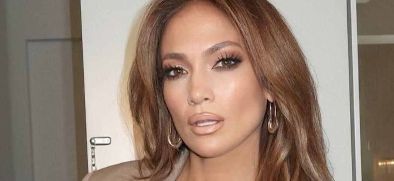 Jennifer Lopez flaunts toned figure as she strips off in plunging