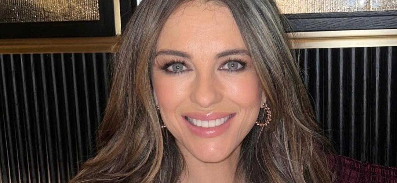 Elizabeth Hurley Bends Over Kitchen Fruit In Tight Swimsuit