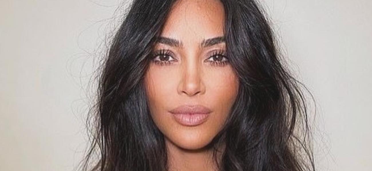 Kim Kardashian Arches Back In Braless Crop Top That’s Too Small