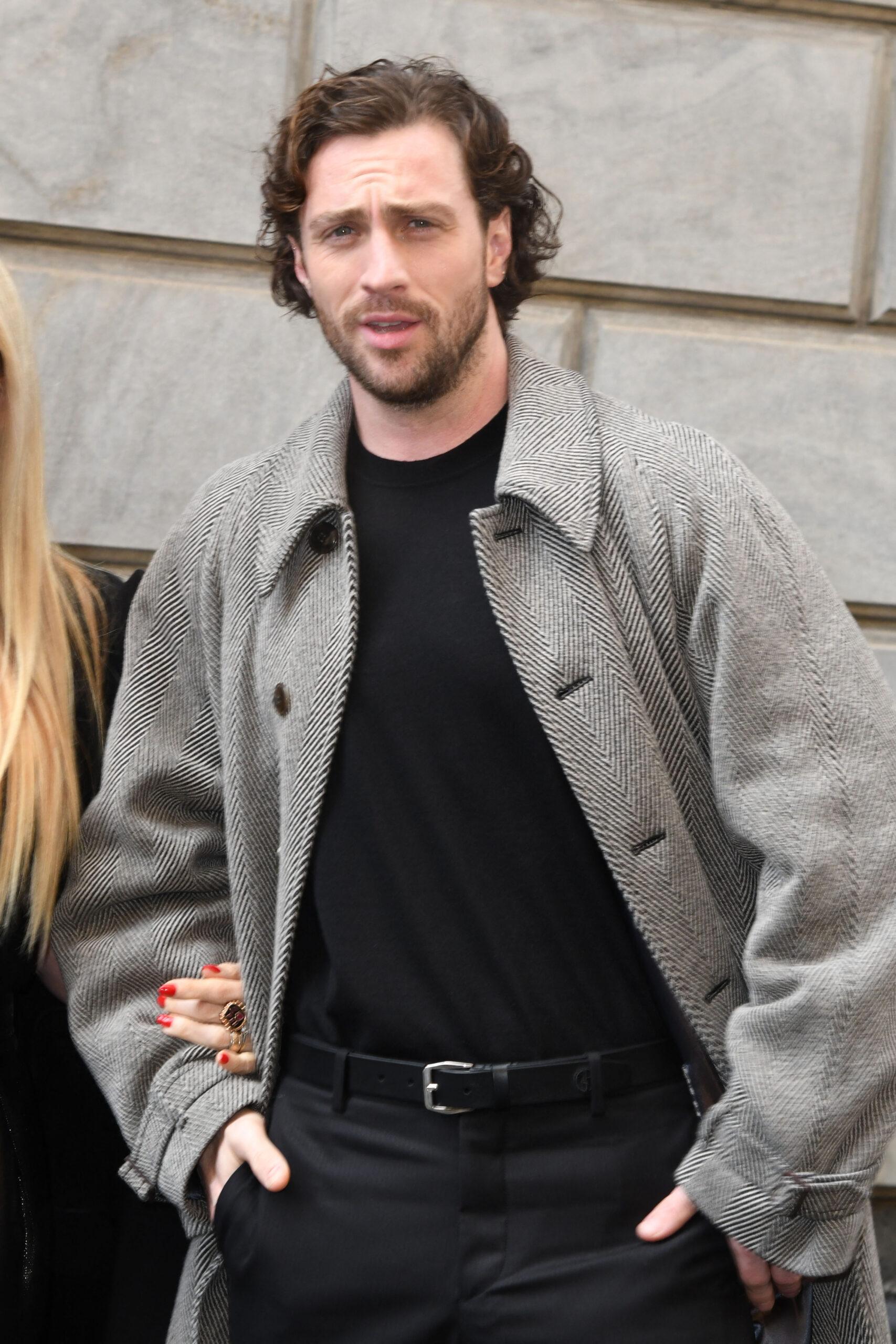 Aaron Taylor-Johnson attends the Giorgio Armani fashion show during the Milan Fashion Week