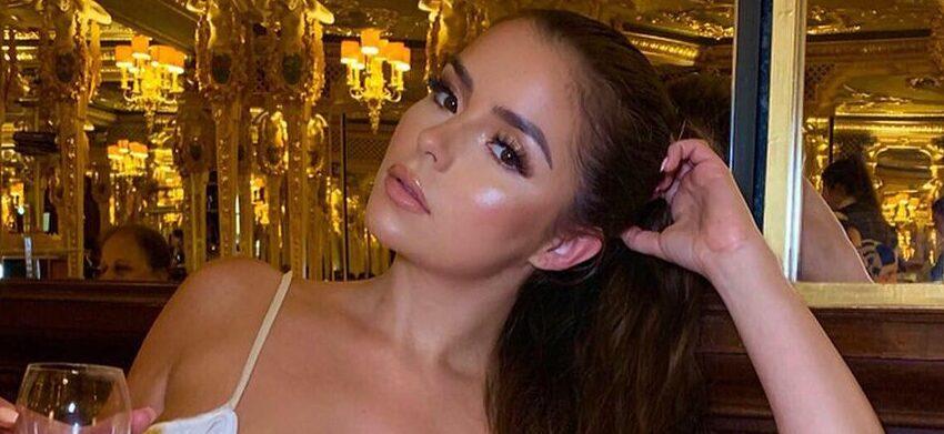 Demi Rose Highlights Her Tiny Waistline In A Skintight Lilac Swimsuit