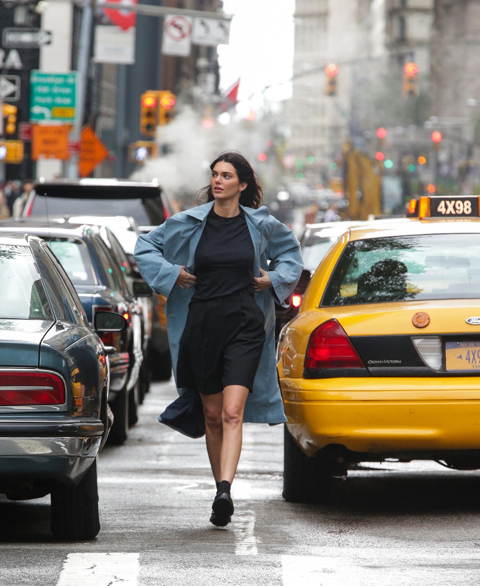 Kendall Jenner seen walking down the street filming a commercial this afternoon in New York City