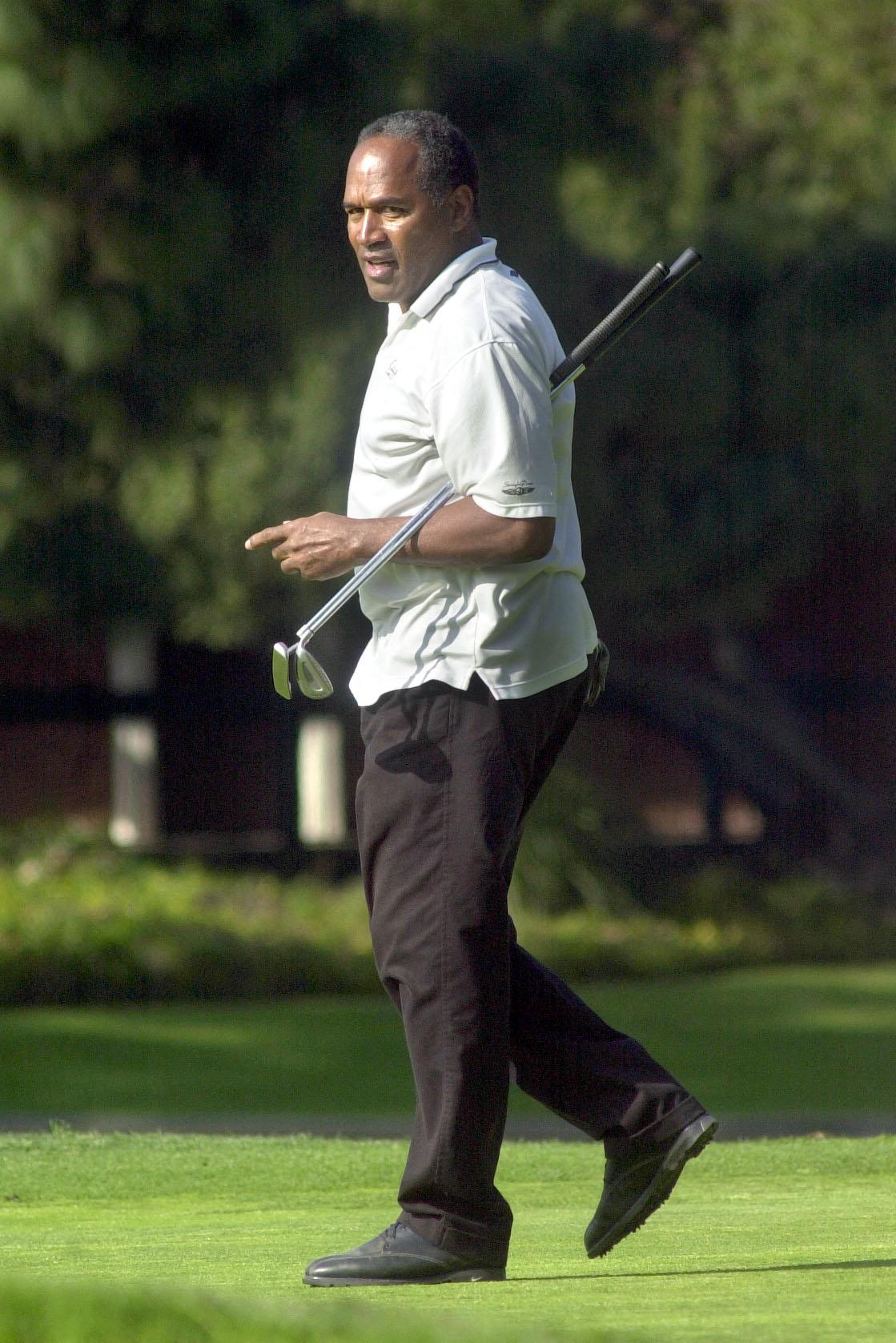 O.J. Simpson playing golf