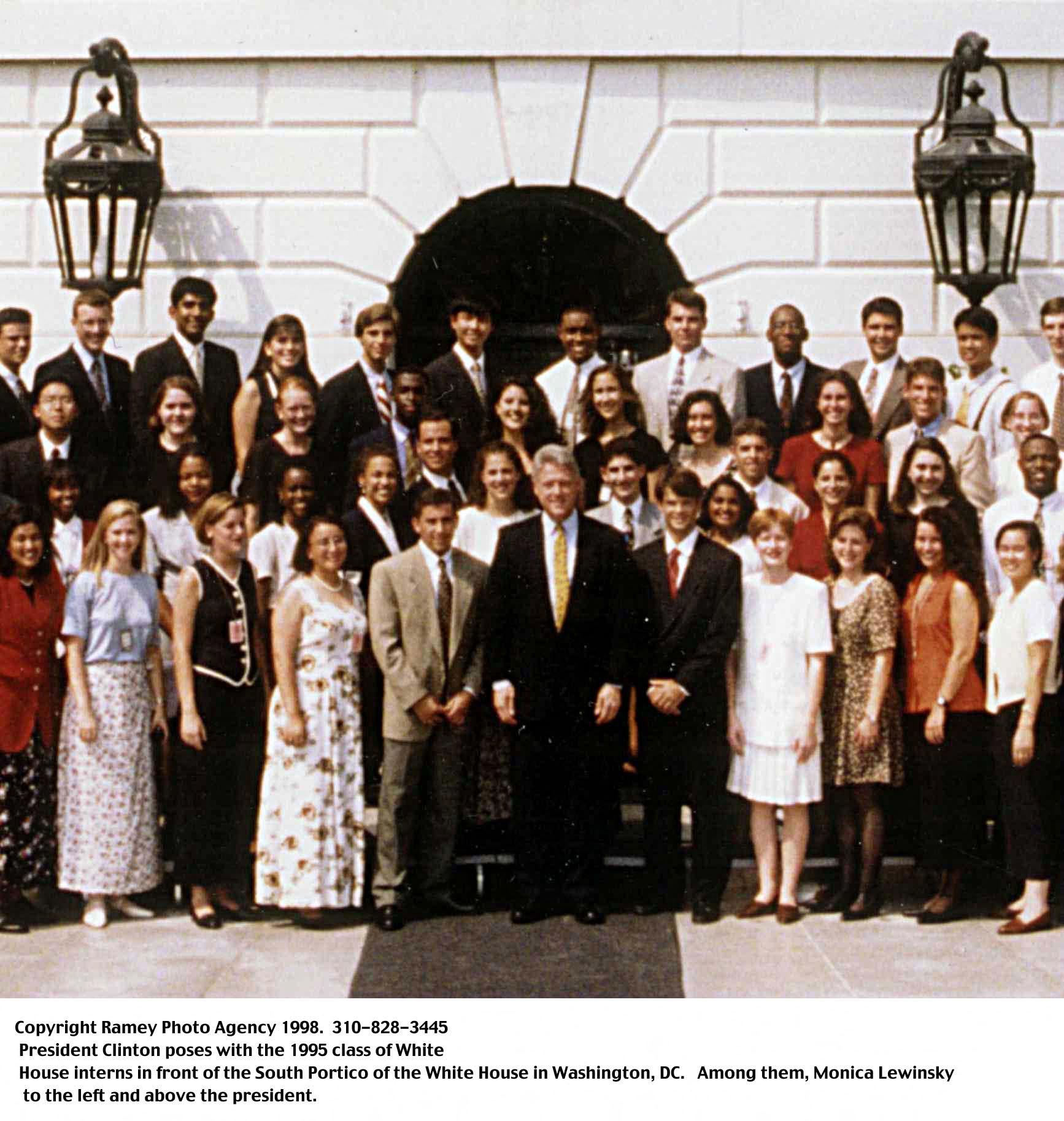 Bill Clinton poses with the 1995 White House interns.