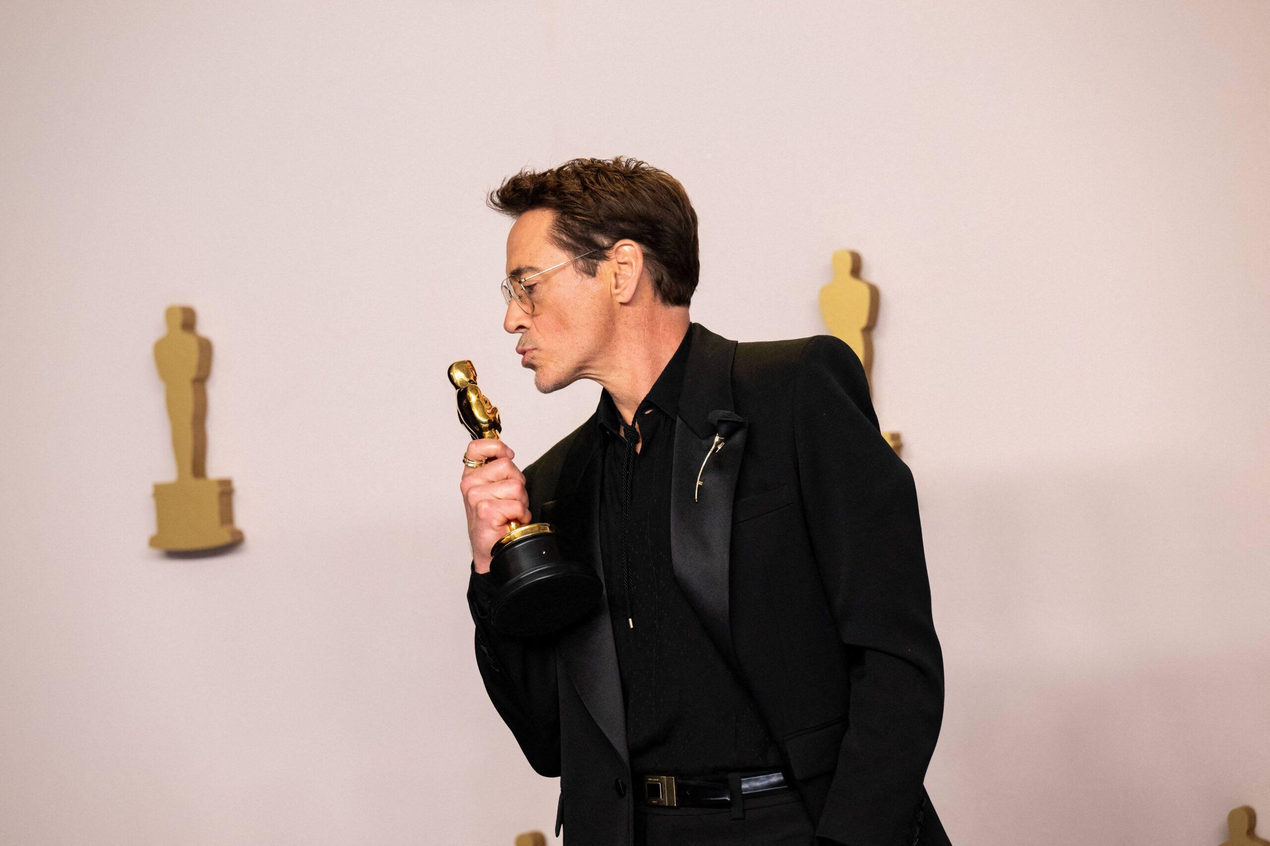 Robert Downey Jr. poses backstage at the Oscars